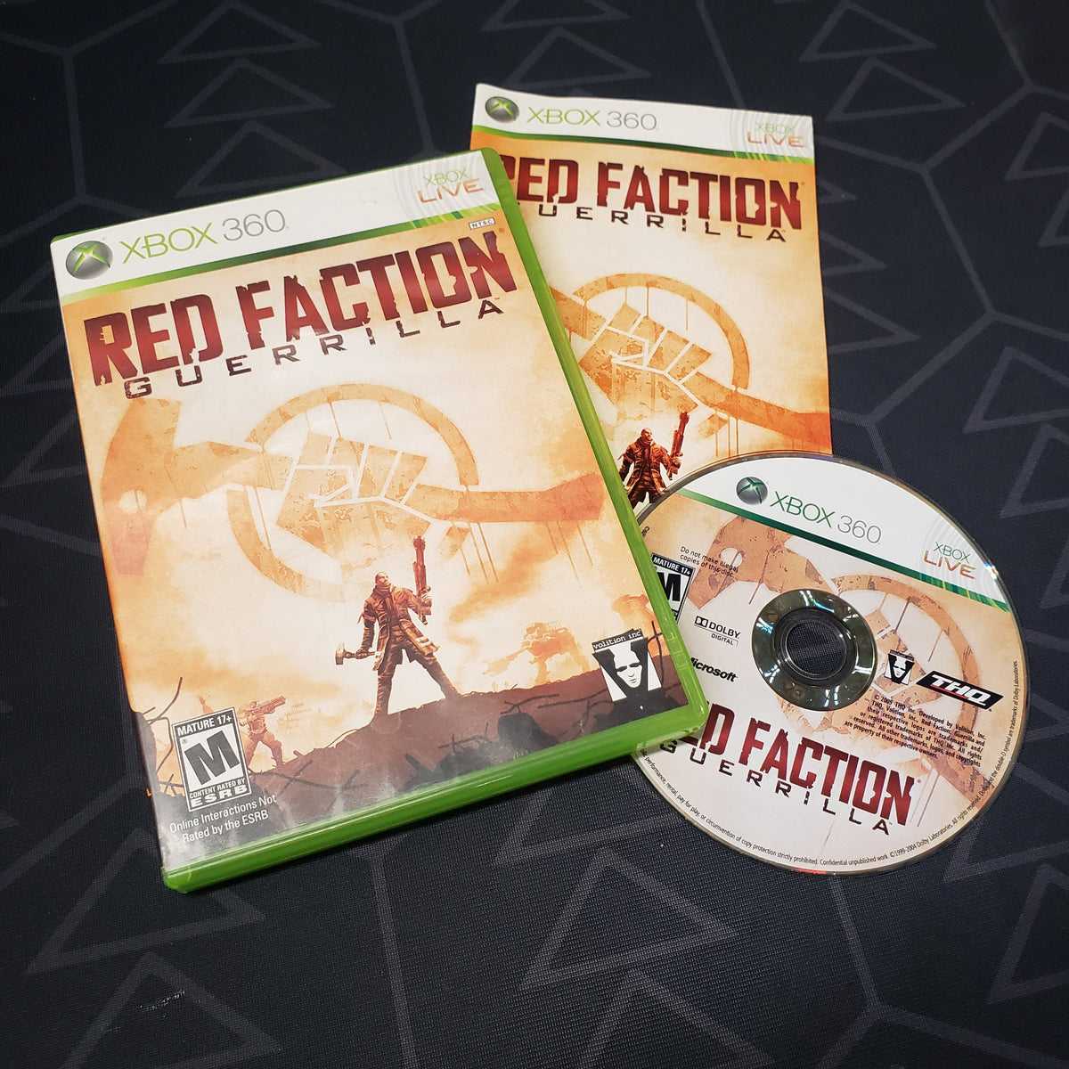 Image shows the case, manual and disc for the video game Red Faction: Guerrilla for Xbox 360