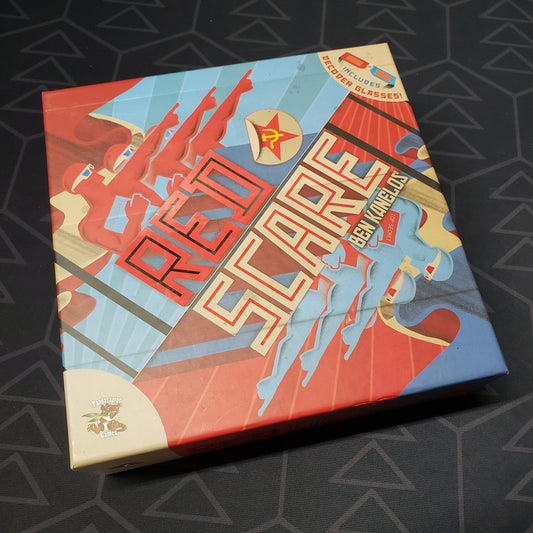 Image shows the front cover of the box of the Red Scare board game