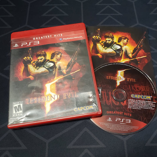 Image shows the case, manual & disc for the video game Resident Evil 5 for Playstation 3
