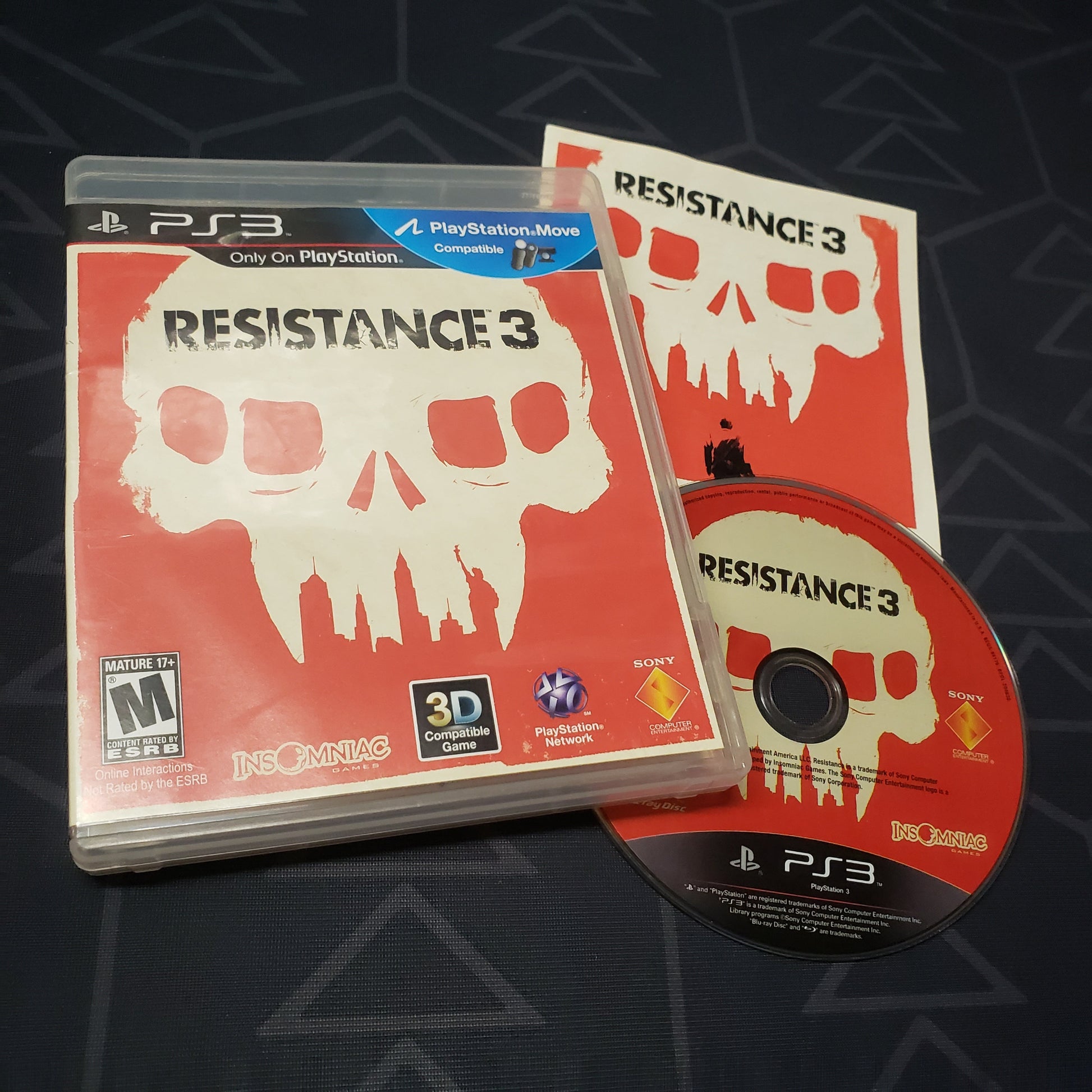 Image shows the case, manual and disc for the video game Resistance 3 for Playstation 3