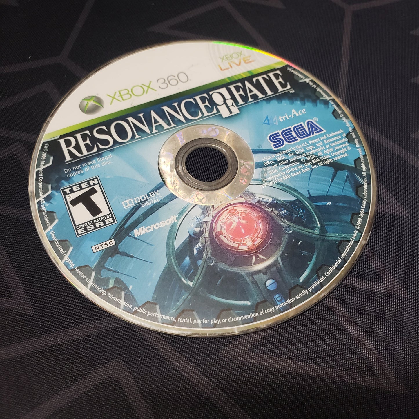 Image shows the game disc for the video game Resonance of Fate for Xbox 360