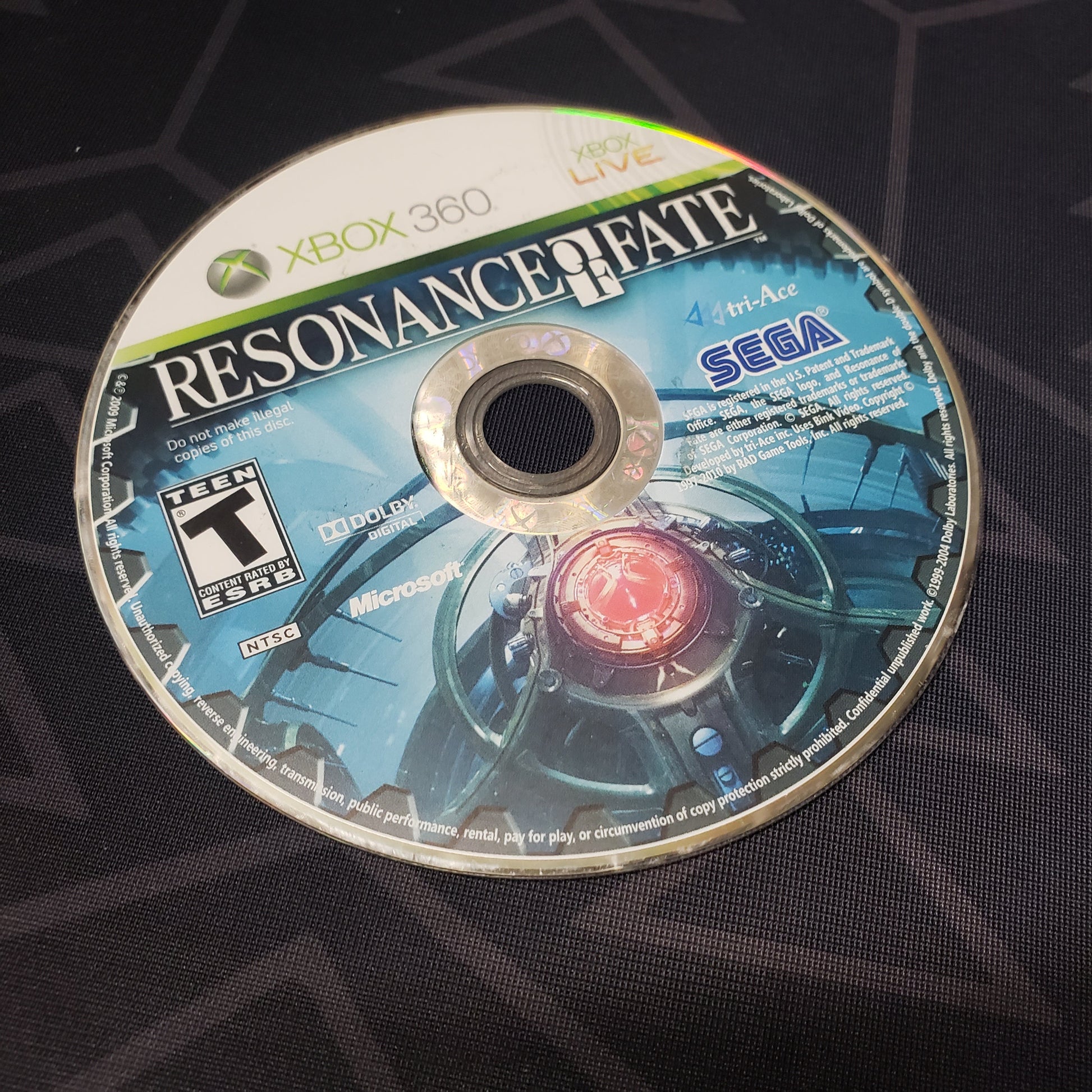Image shows the game disc for the video game Resonance of Fate for Xbox 360