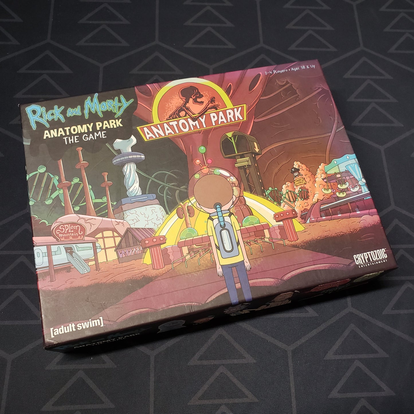 Image shows the front cover of the box of the Rick & Morty: Anatomy Park board game