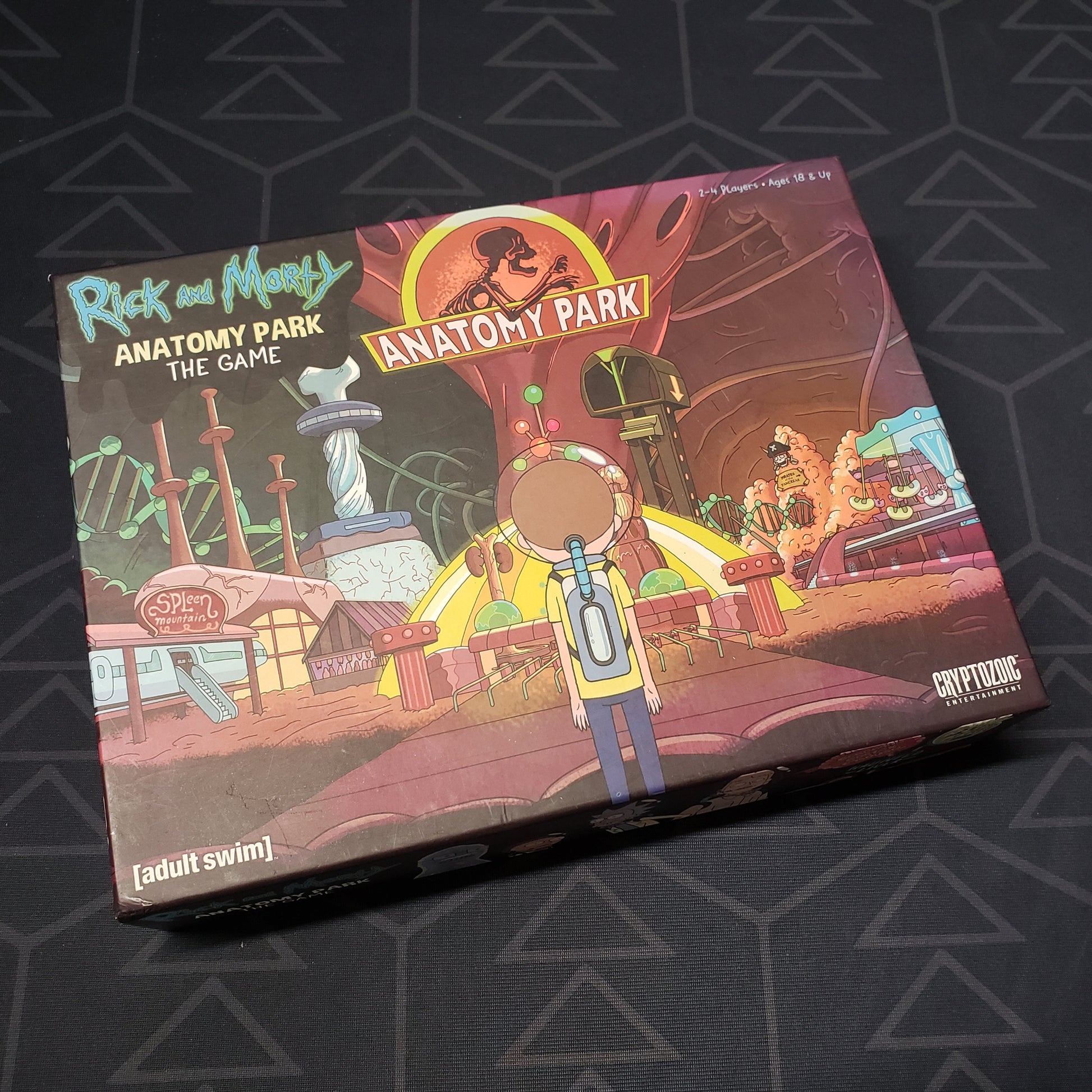 Image shows the front cover of the box of the Rick & Morty: Anatomy Park board game