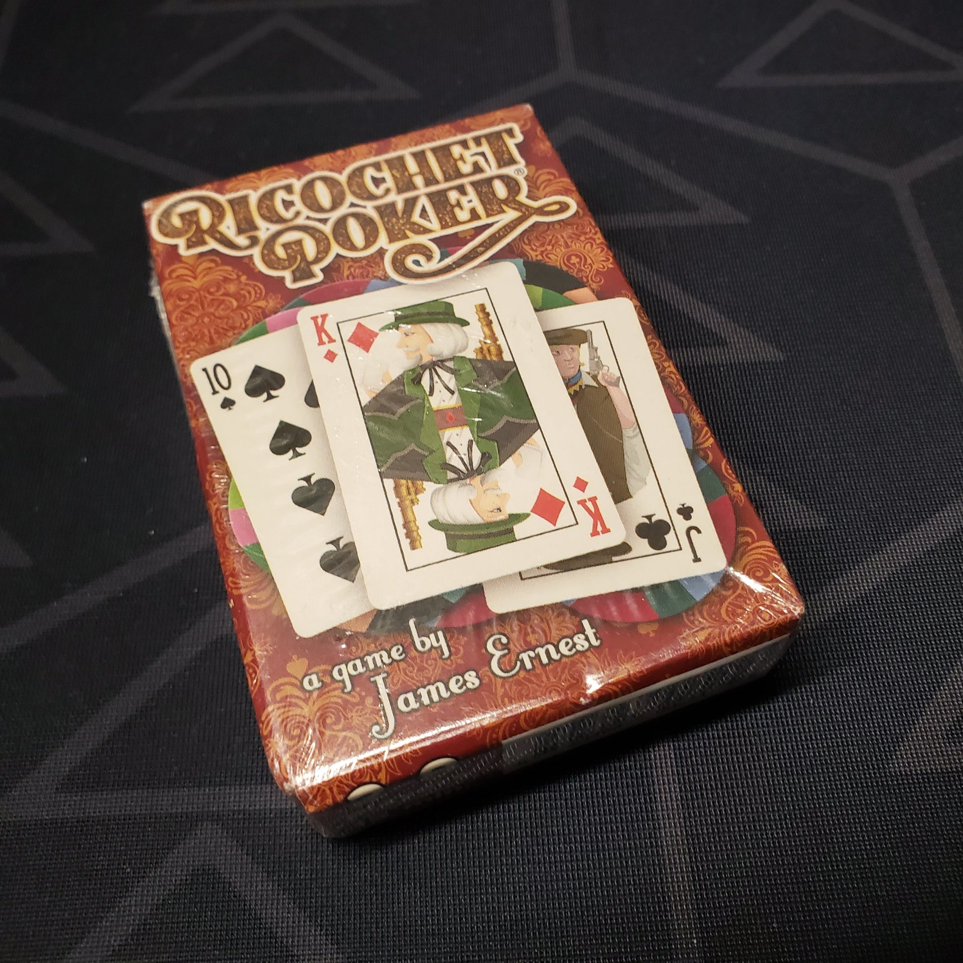 Image shows the front cover of the box for the Ricochet Poker card game