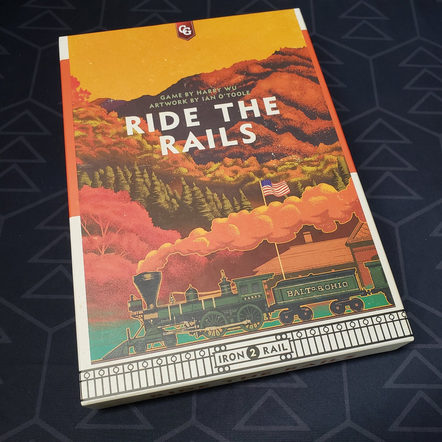 Image shows the front cover of the box of the Ride the Rails board game