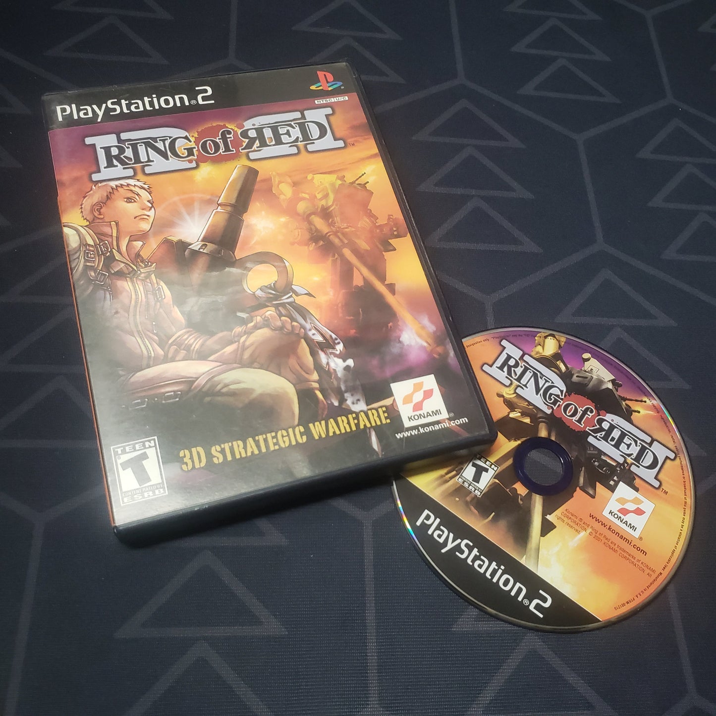 Image shows the case and disc for the video game Ring of Red for Playstation 2