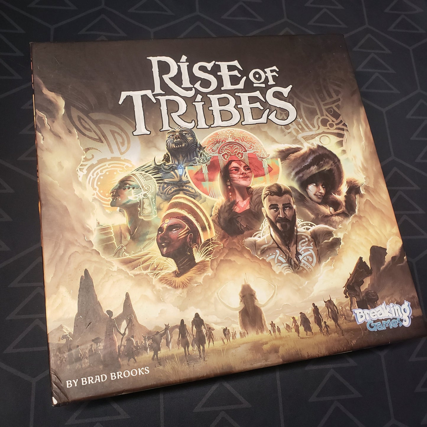 Image shows the front cover of the box for the Rise of Tribes board game