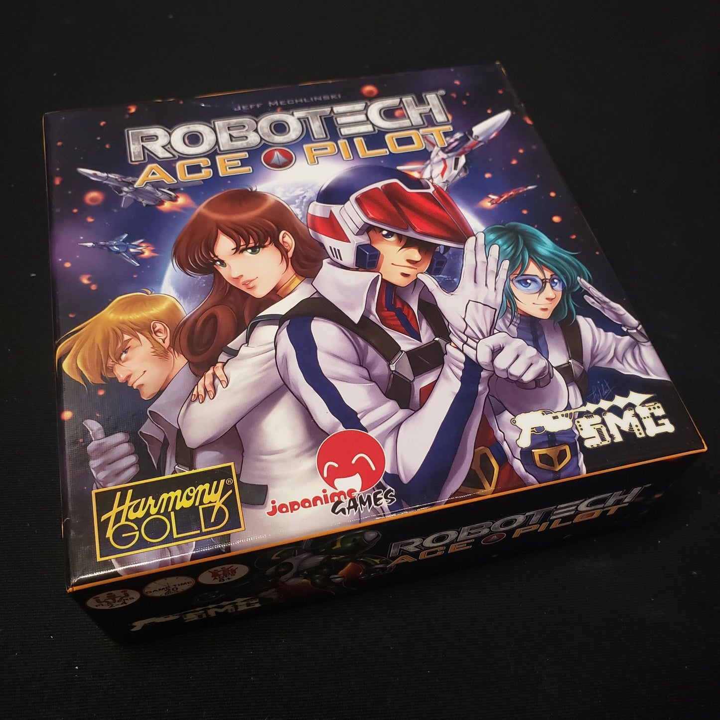 Image shows the front cover of the box of the Robotech: Ace Pilot board game