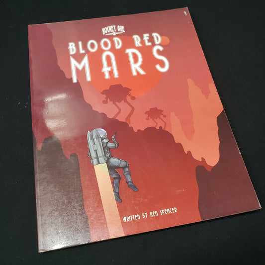 Image shows the front cover of the Blood Red mars book for the roleplaying game Rocket Age
