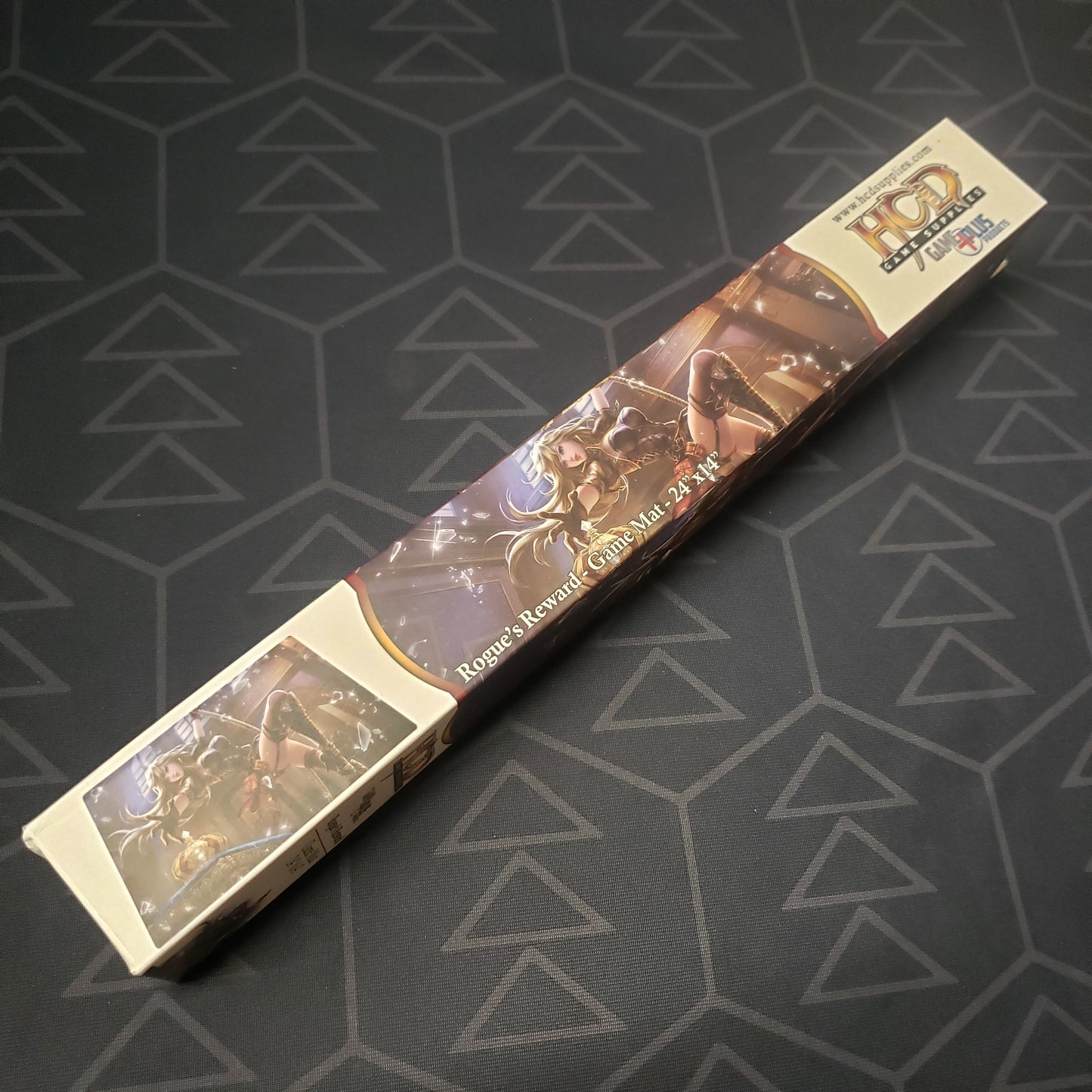 Image shows the side of the box for the Rogue's Reward card game playmat