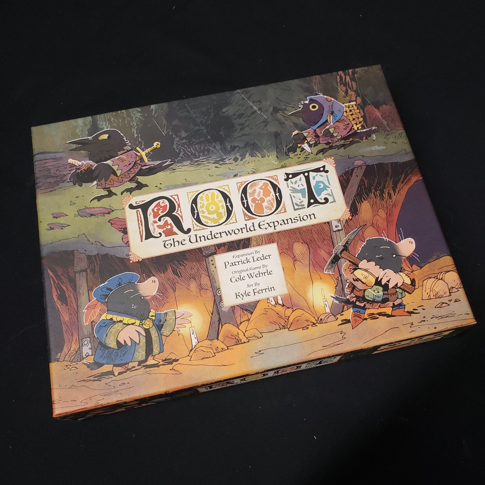 Image shows the front cover of the box for the Underworld expansion from the board game Root