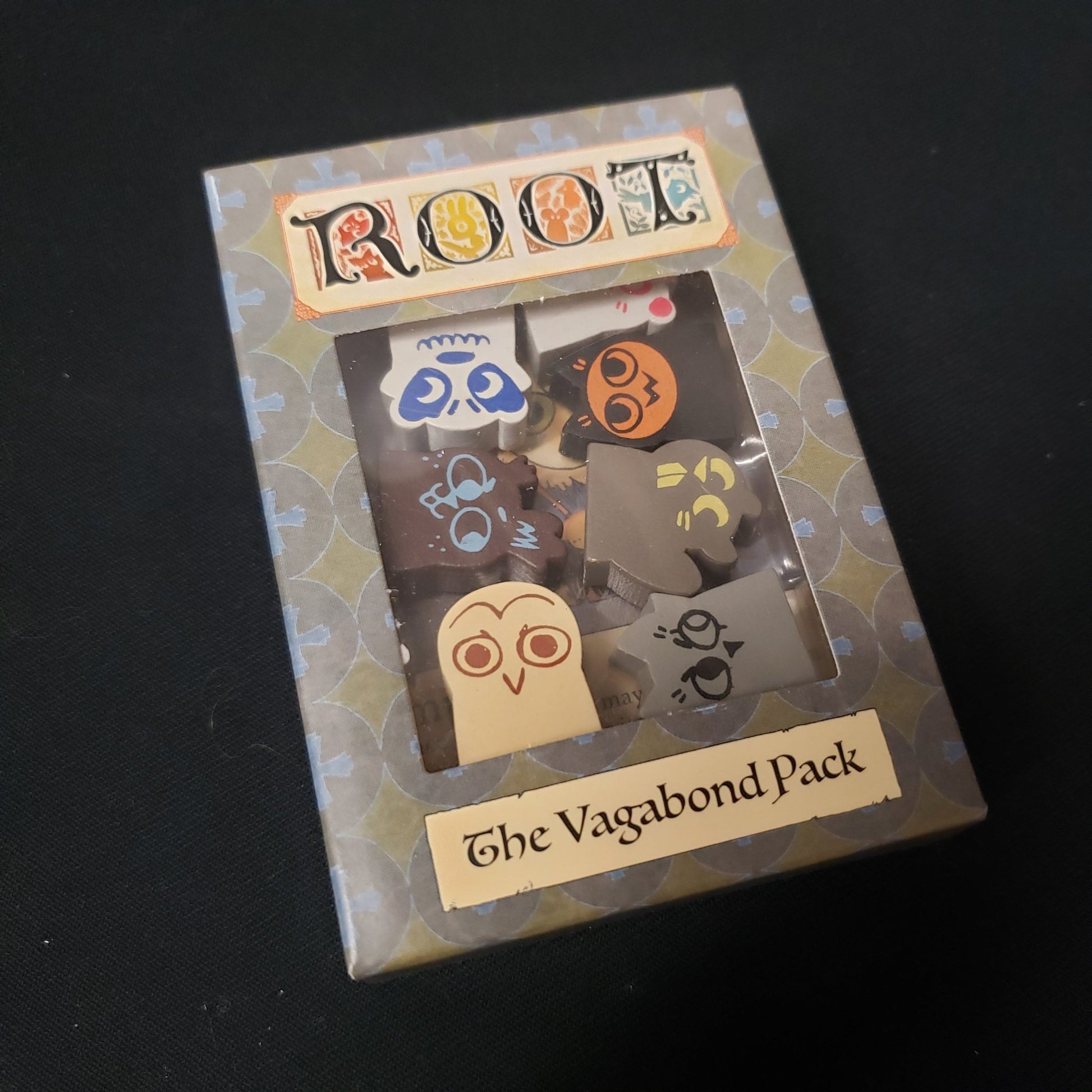Image shows the front cover of the box for the Vagabond Pack expansion from the board game Root