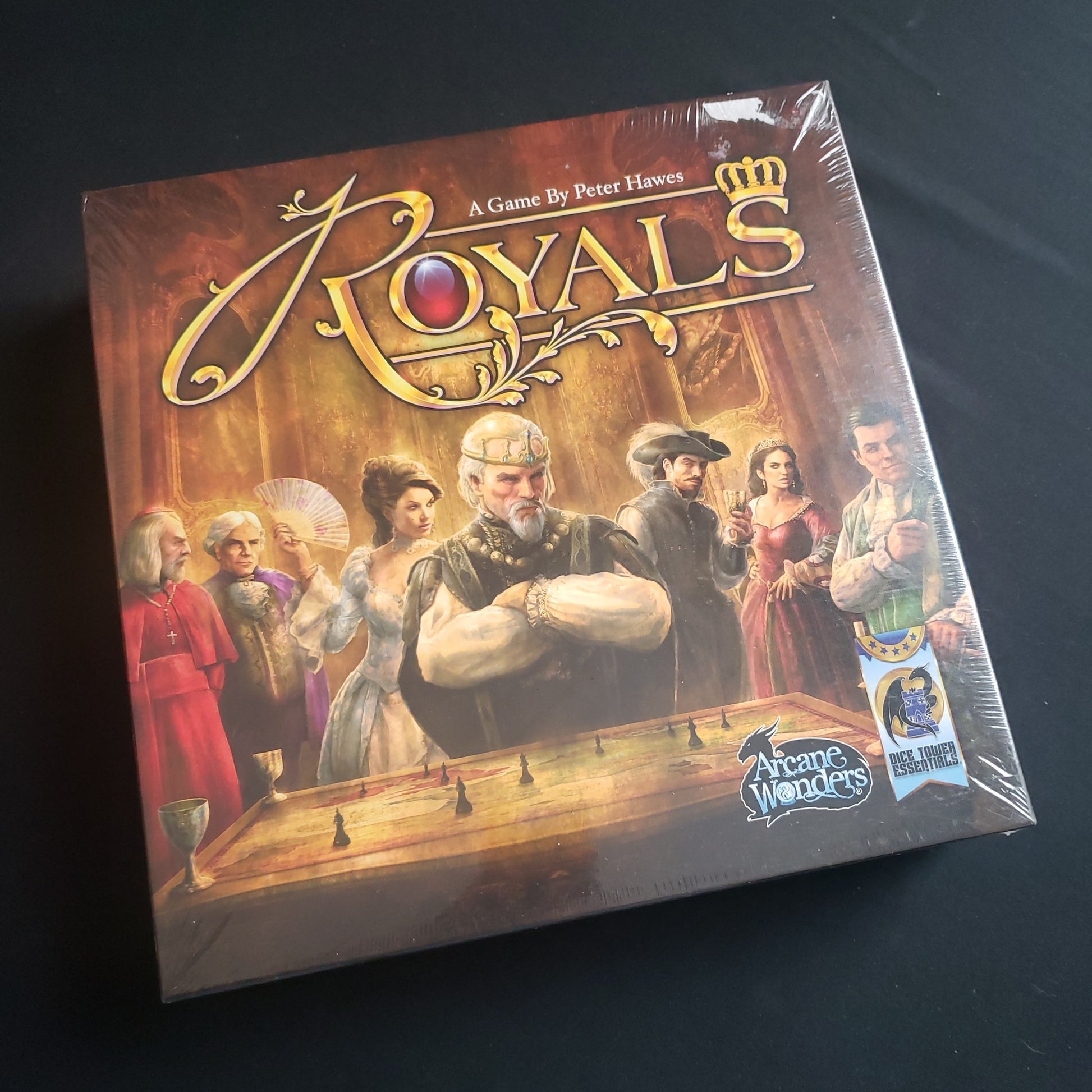 Image shows the front cover of the box of the Royals board game