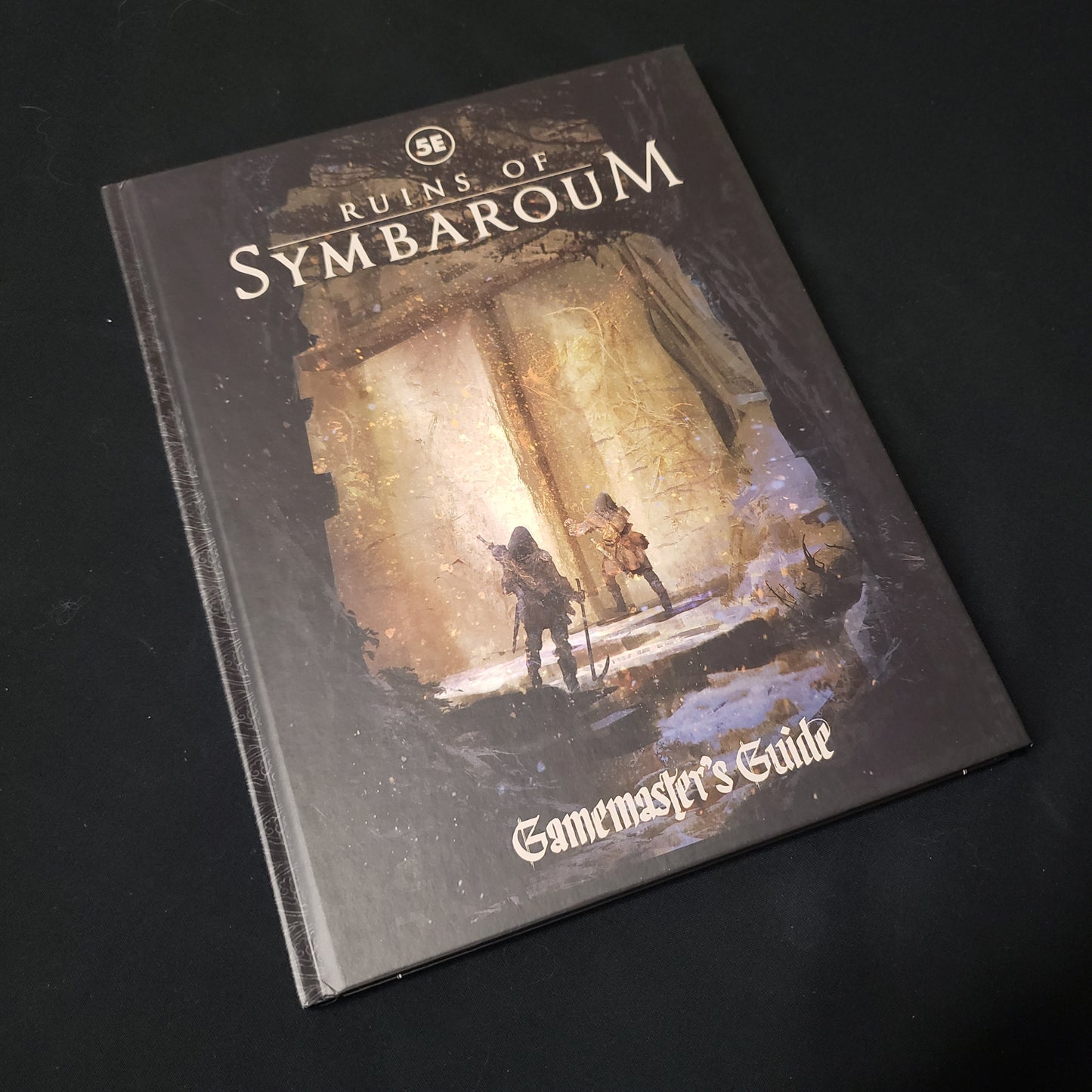 Image shows the front cover of the Gamemaster's Guide book for the Ruins of Symbaroum roleplaying game