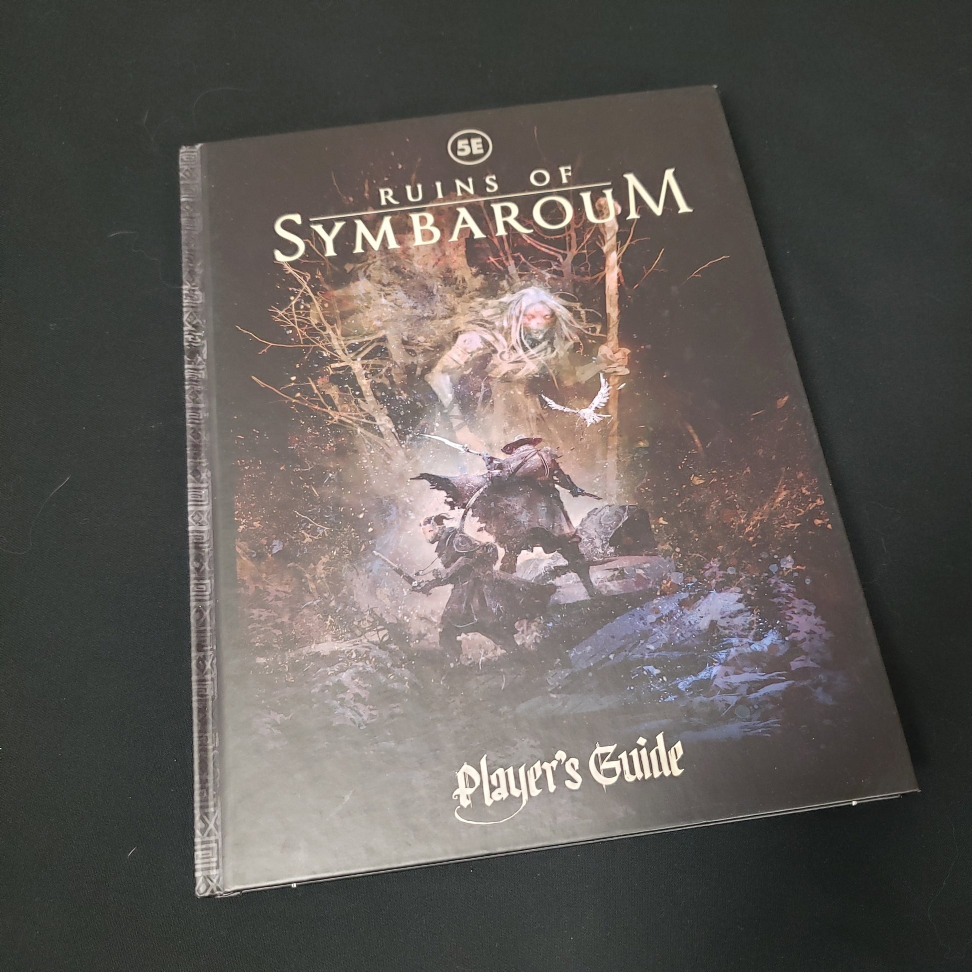 Image shows the front cover of the Player's Guide book for the Ruins of Symbaroum roleplaying game