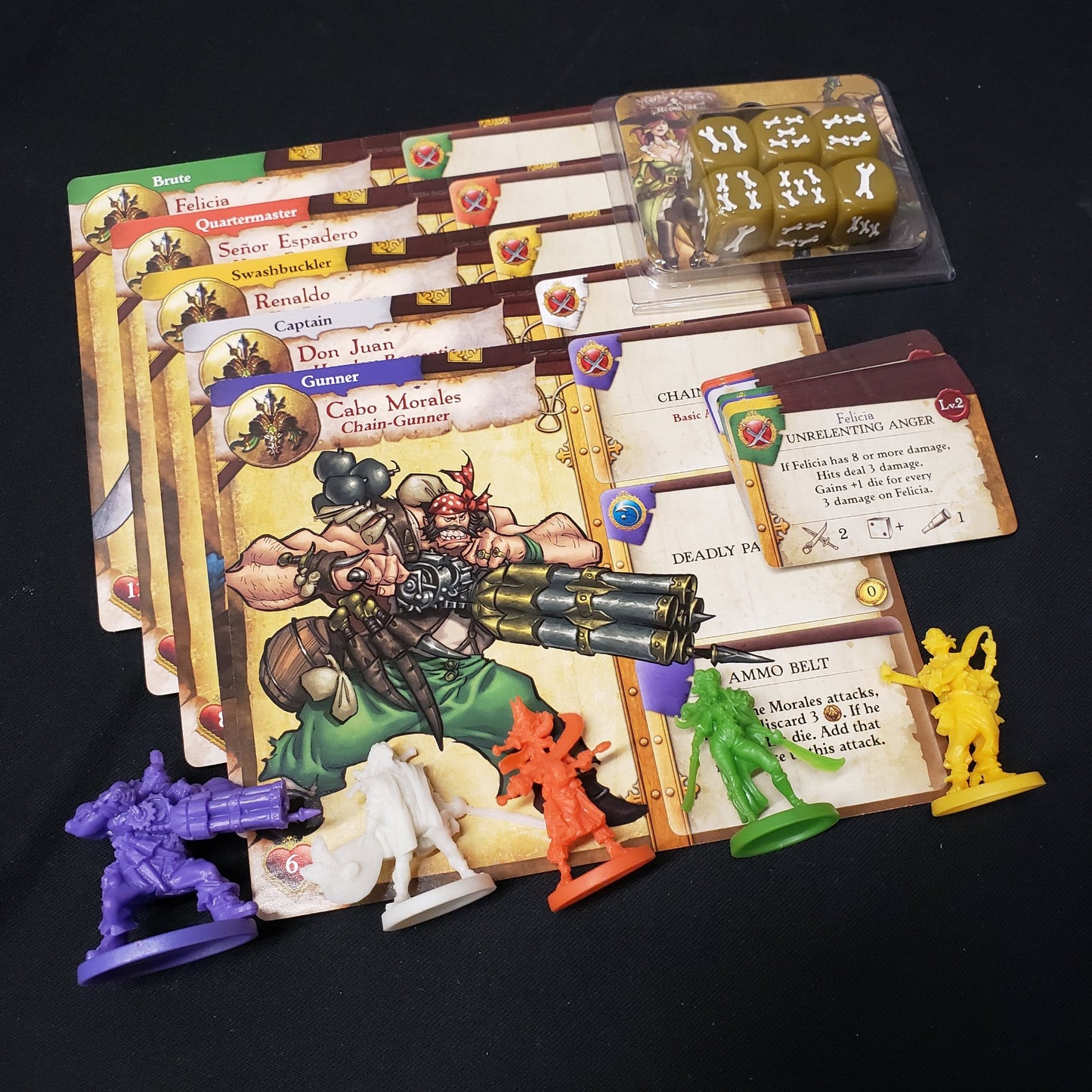 Image shows the miniatures and cards for the Marea de la Muerte Heroes expansion for the board game Rum & Bones: Second Tide
