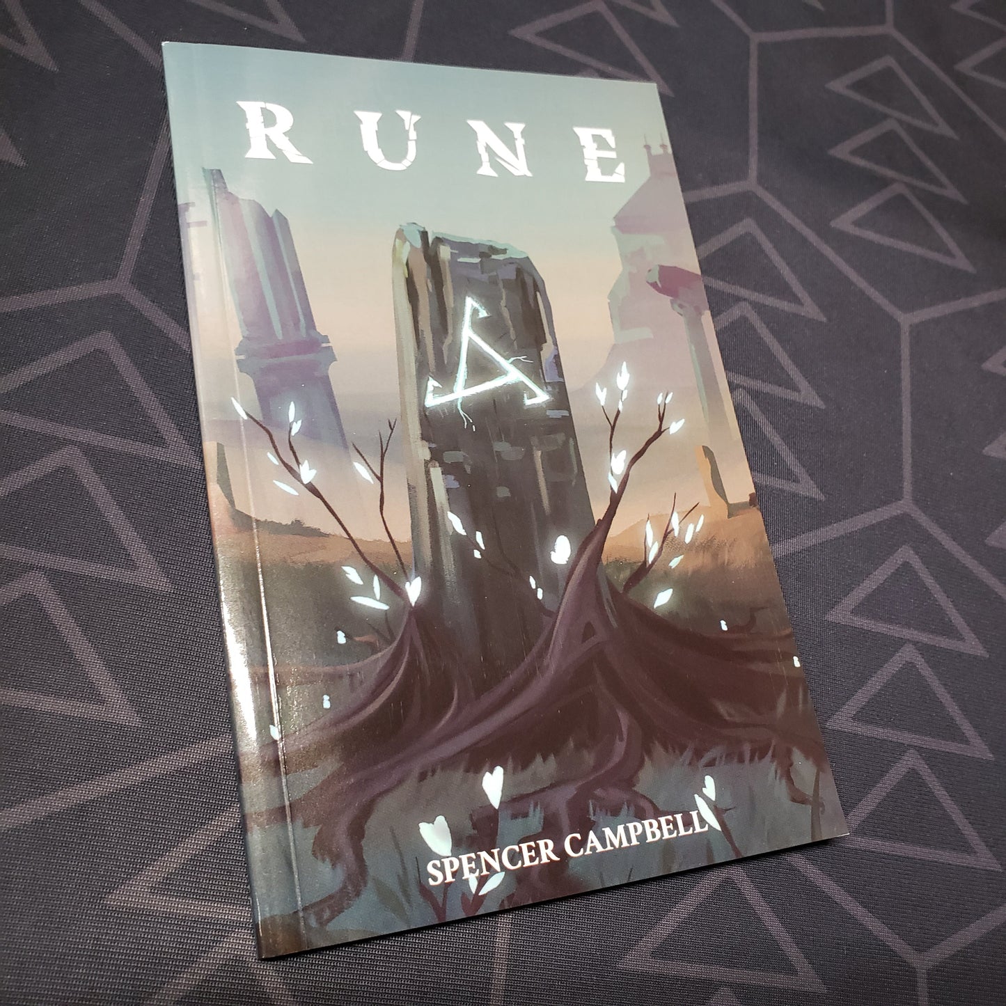 Image shows the front cover of the RUNE solo roleplaying game book
