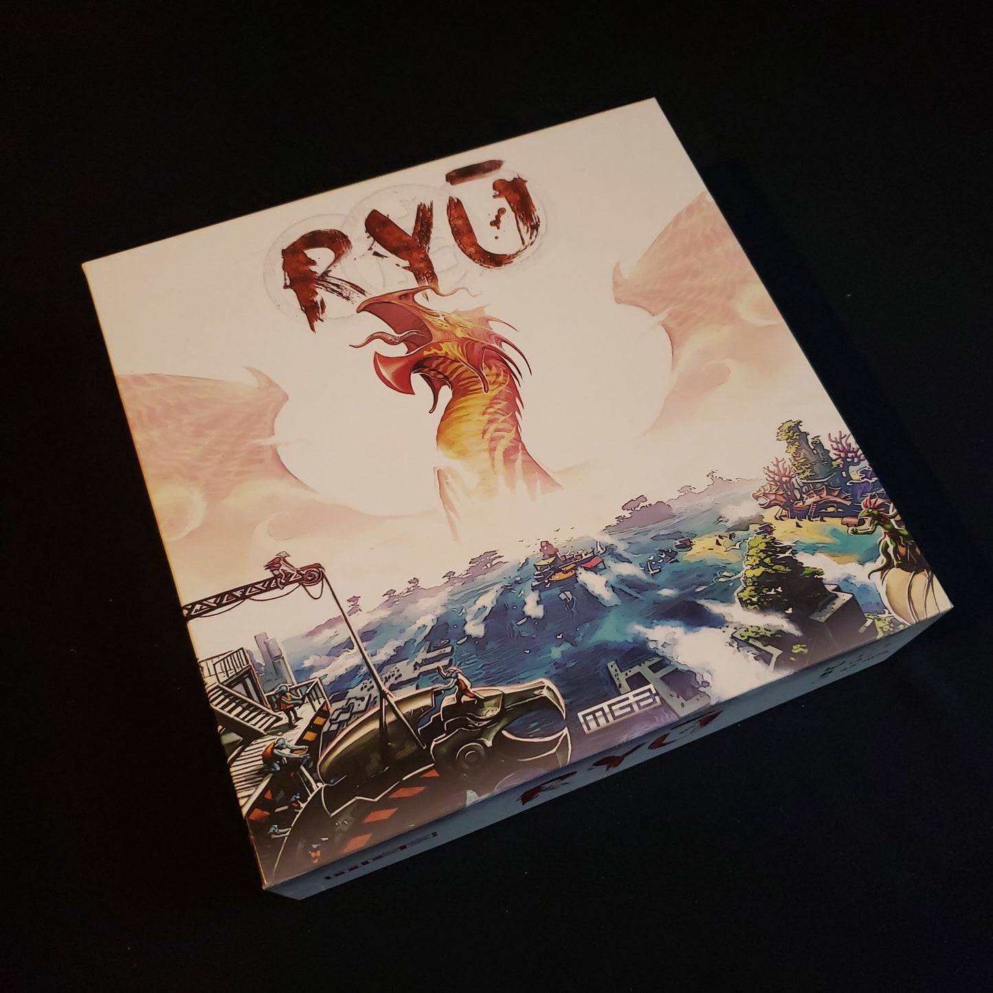 Image shows the front cover of the box of the Ryu board game