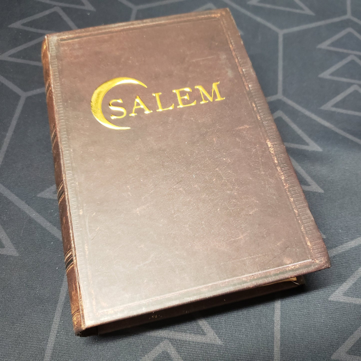 Image shows the front cover of the box of the original printing of the card game Salem 1692