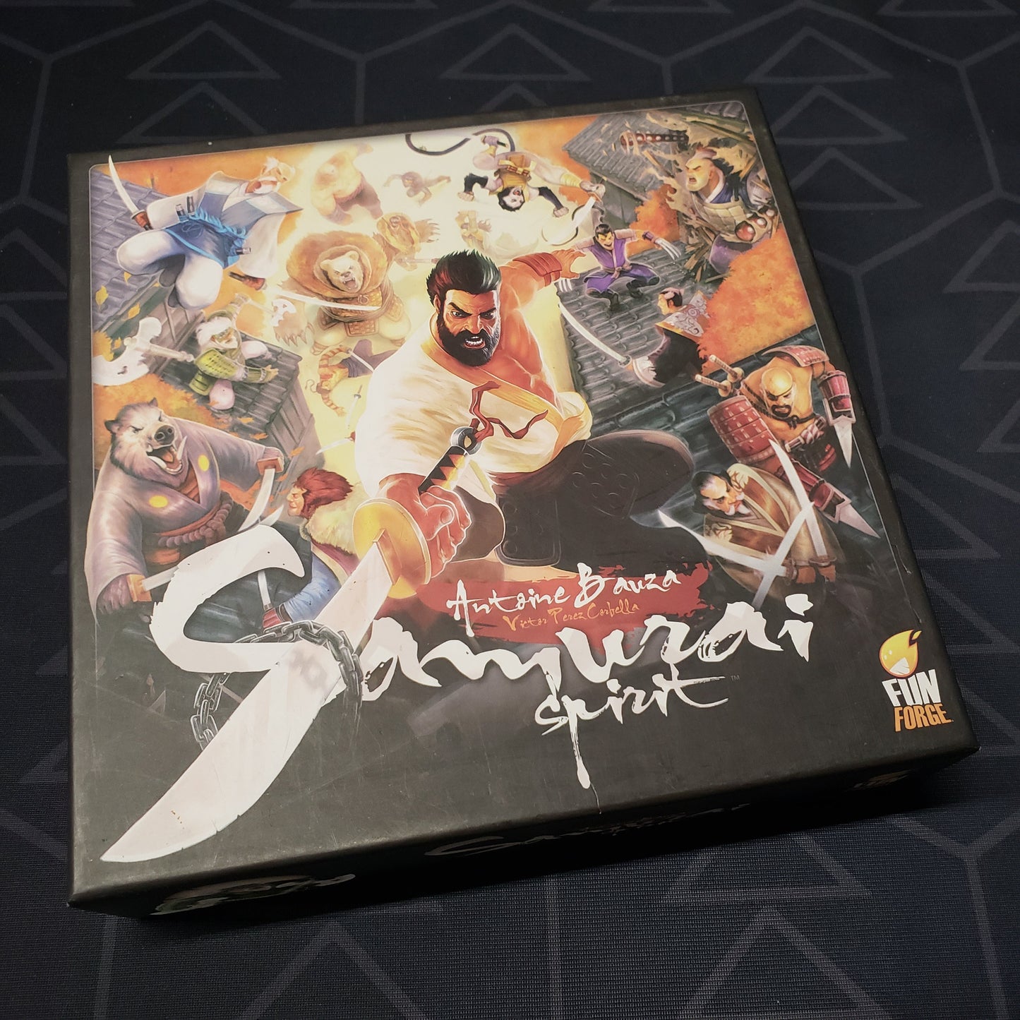Image shows the front cover of the box of the Samurai Spirit board game