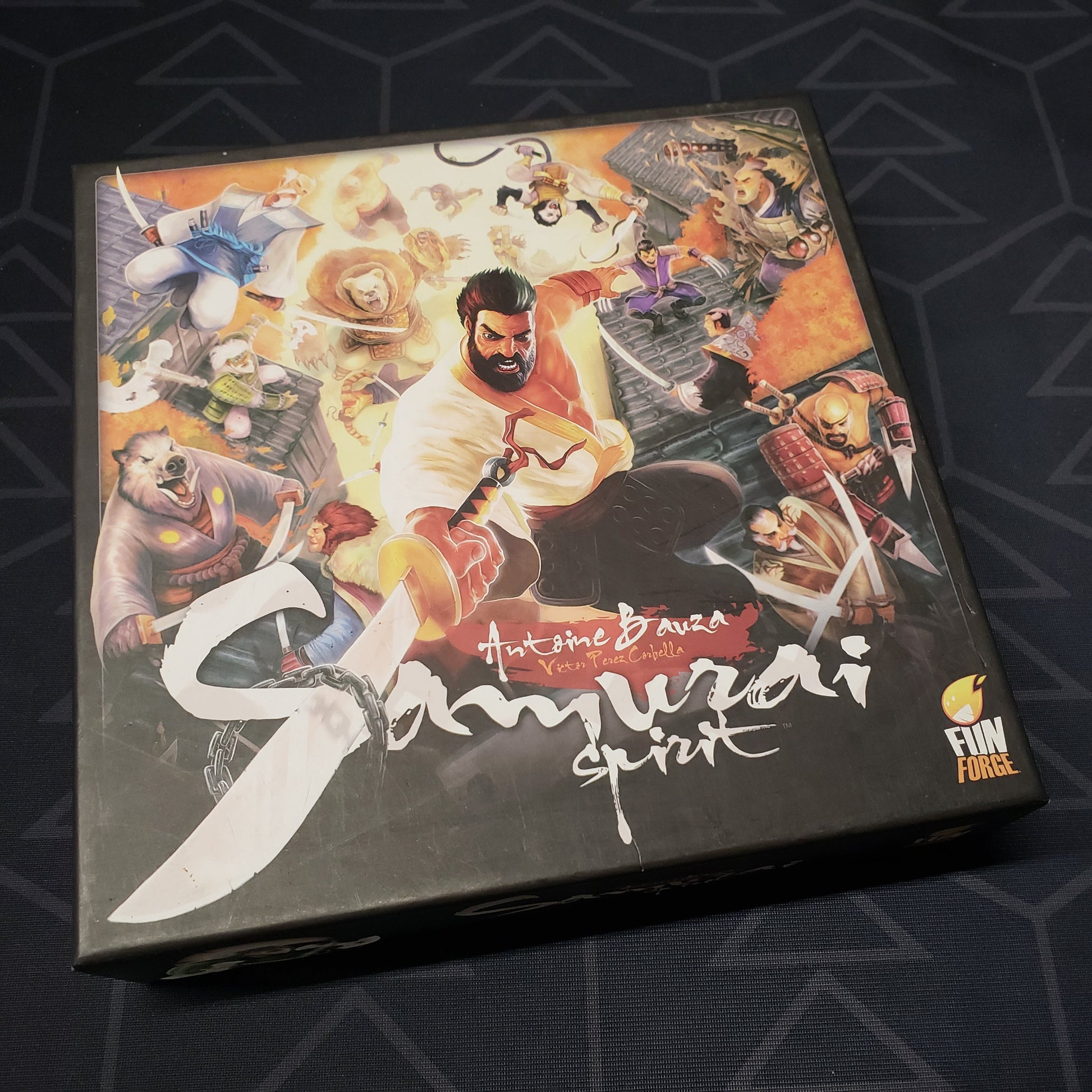 Image shows the front cover of the box of the Samurai Spirit board game
