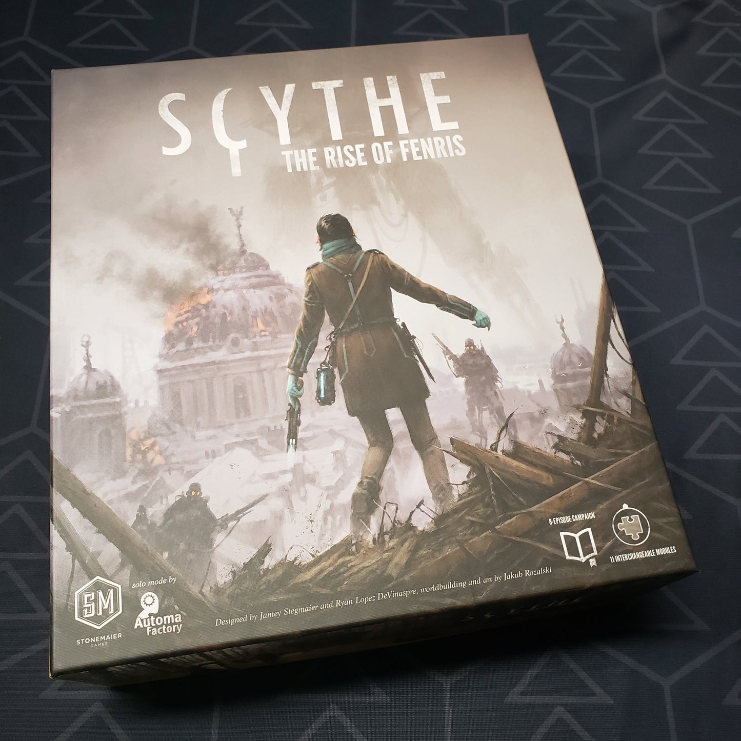Image shows the front cover of the box of the Rise of Fenris expansion for the board game Scythe