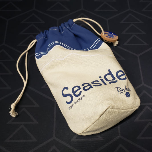 Image shows the drawstring carryong bag of the board game Seaside