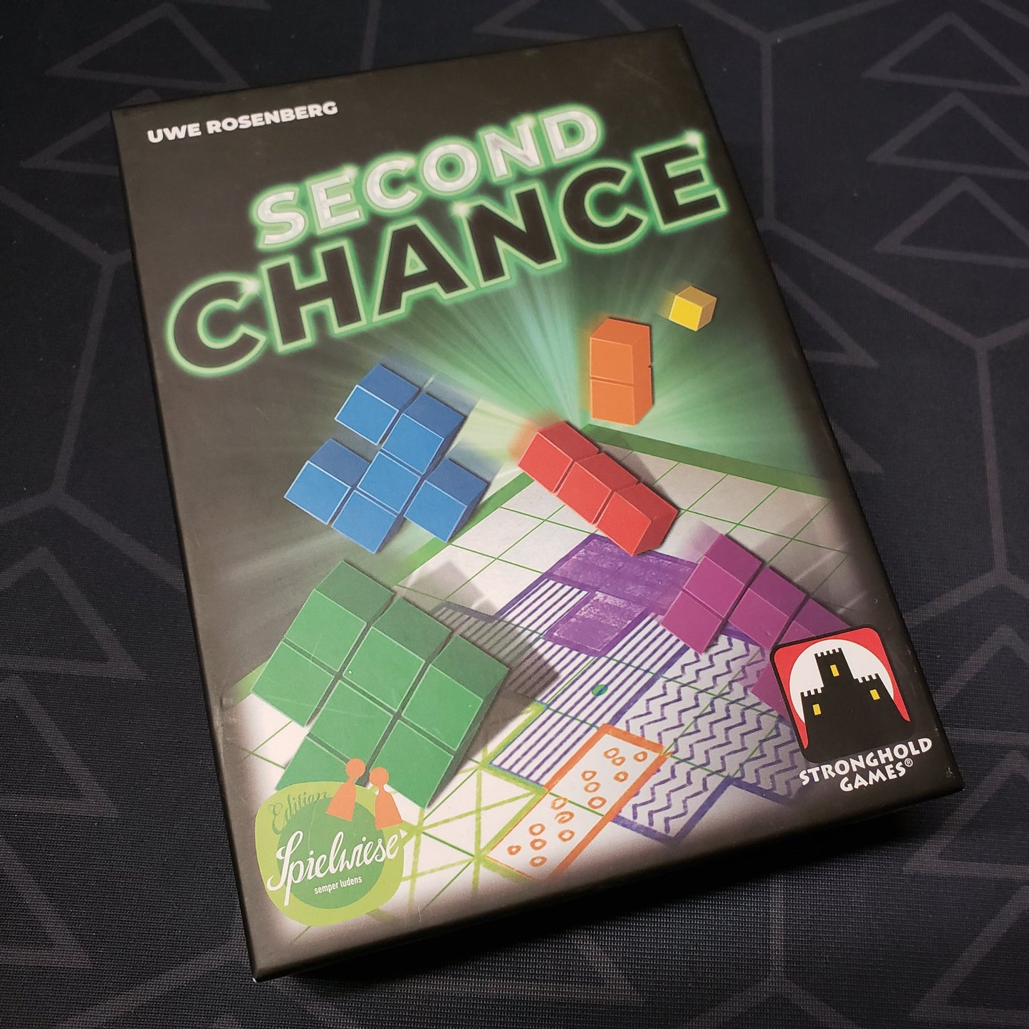 Image shows the front cover of the box for the Second Chance board game