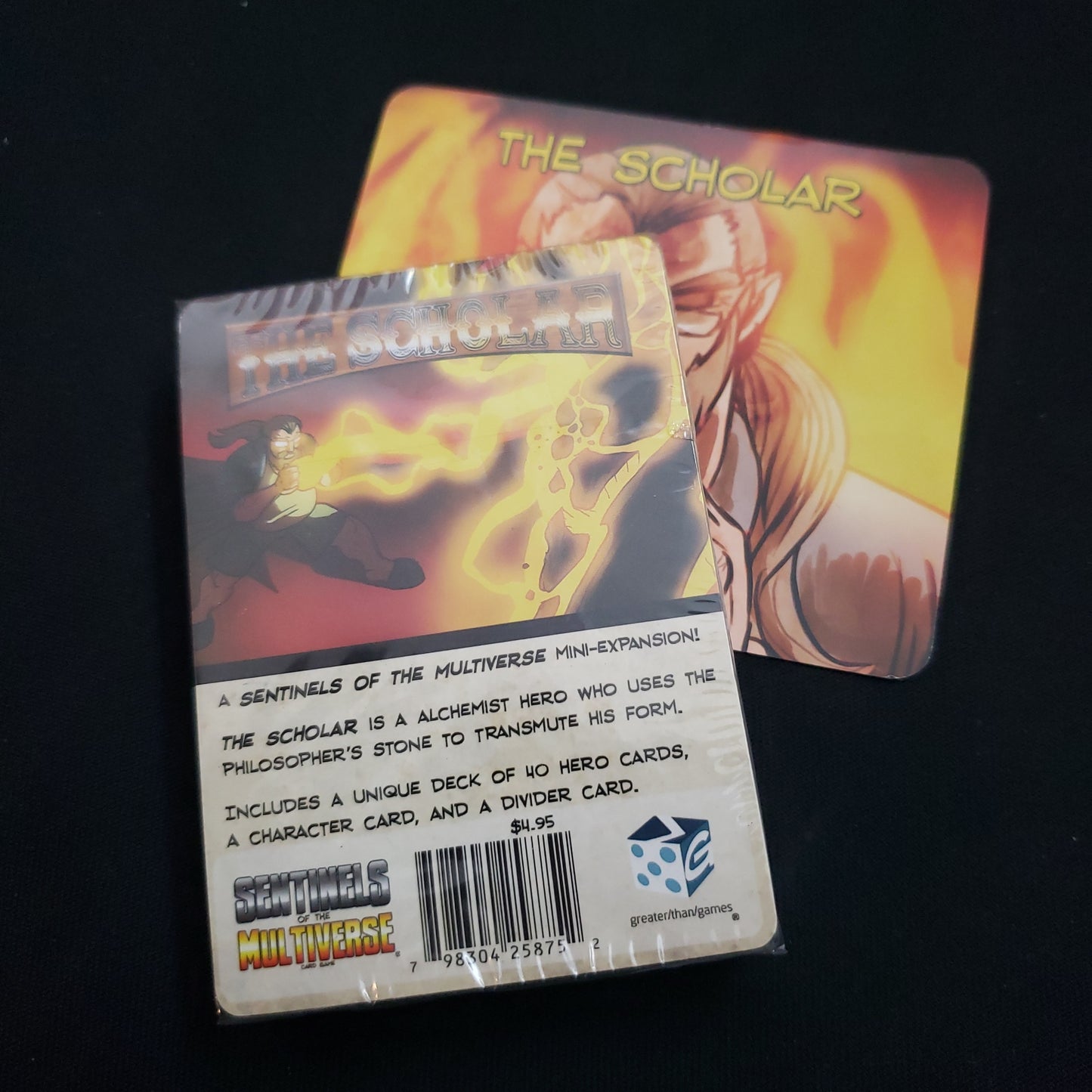Image shows the deck and divider card for the Scholar Character Pack for the Sentinels of the Multiverse card game