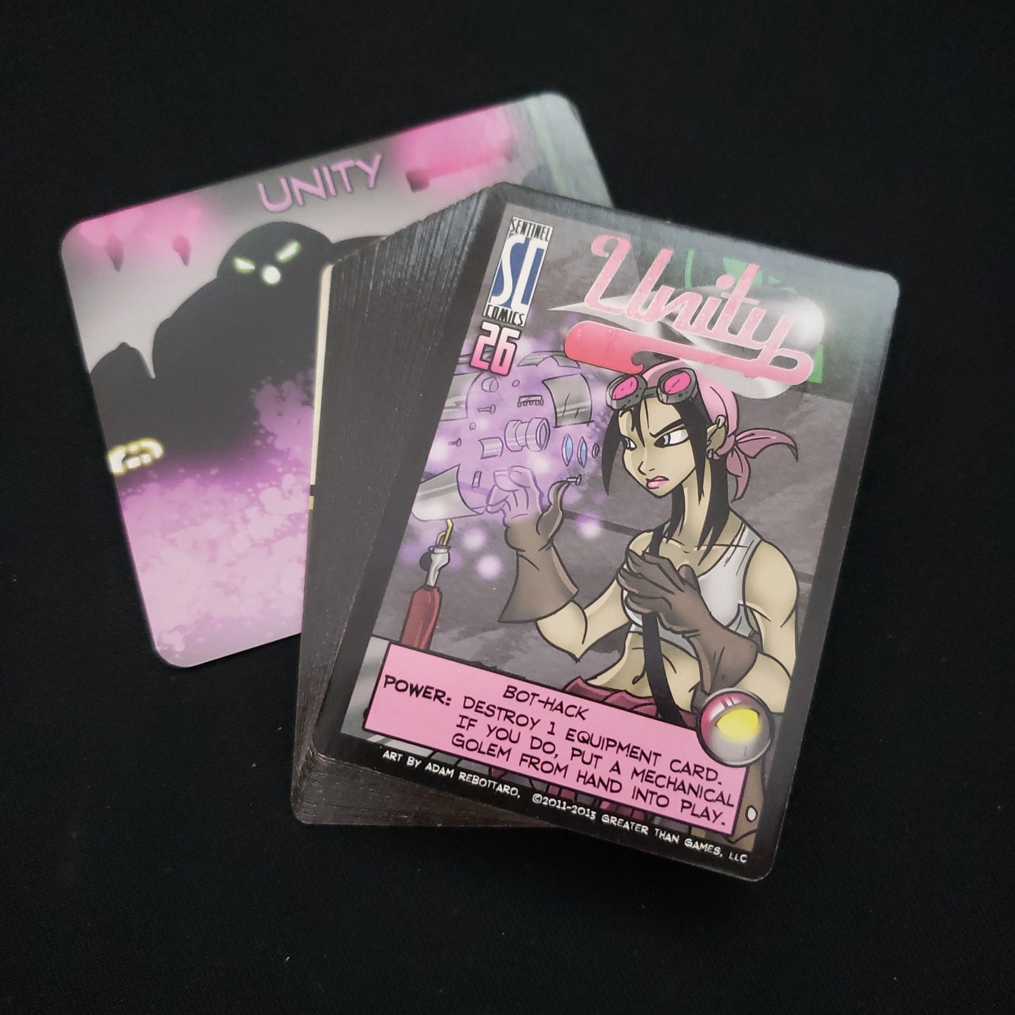 Image shows the deck and divider card for the Unity Character Pack for the Sentinels of the Multiverse card game