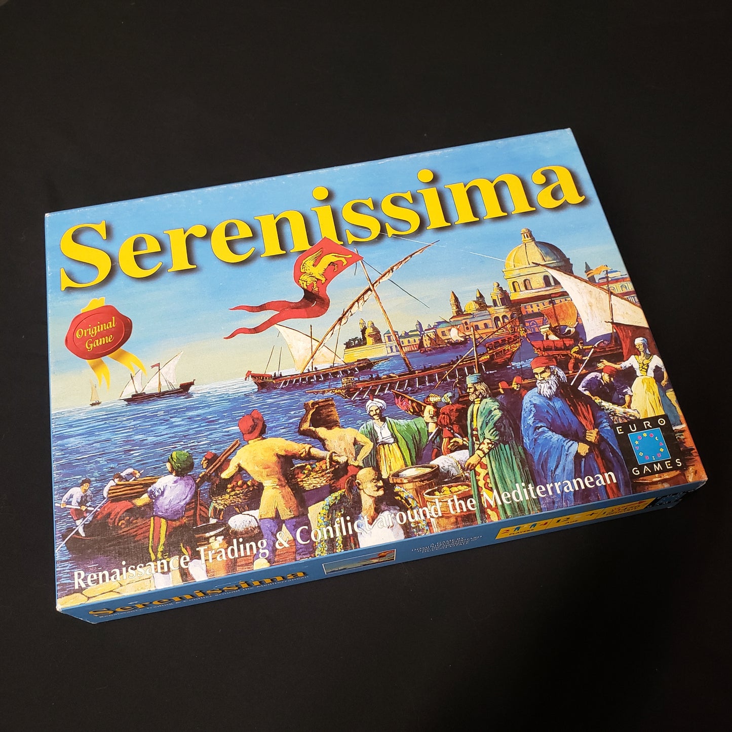 Image shows the front cover of the box of the Serenissima board game