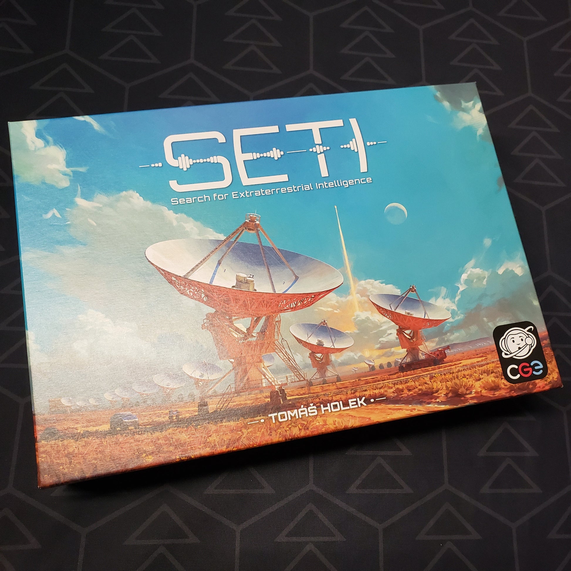 Image shows the front cover of the box of the SETI board game