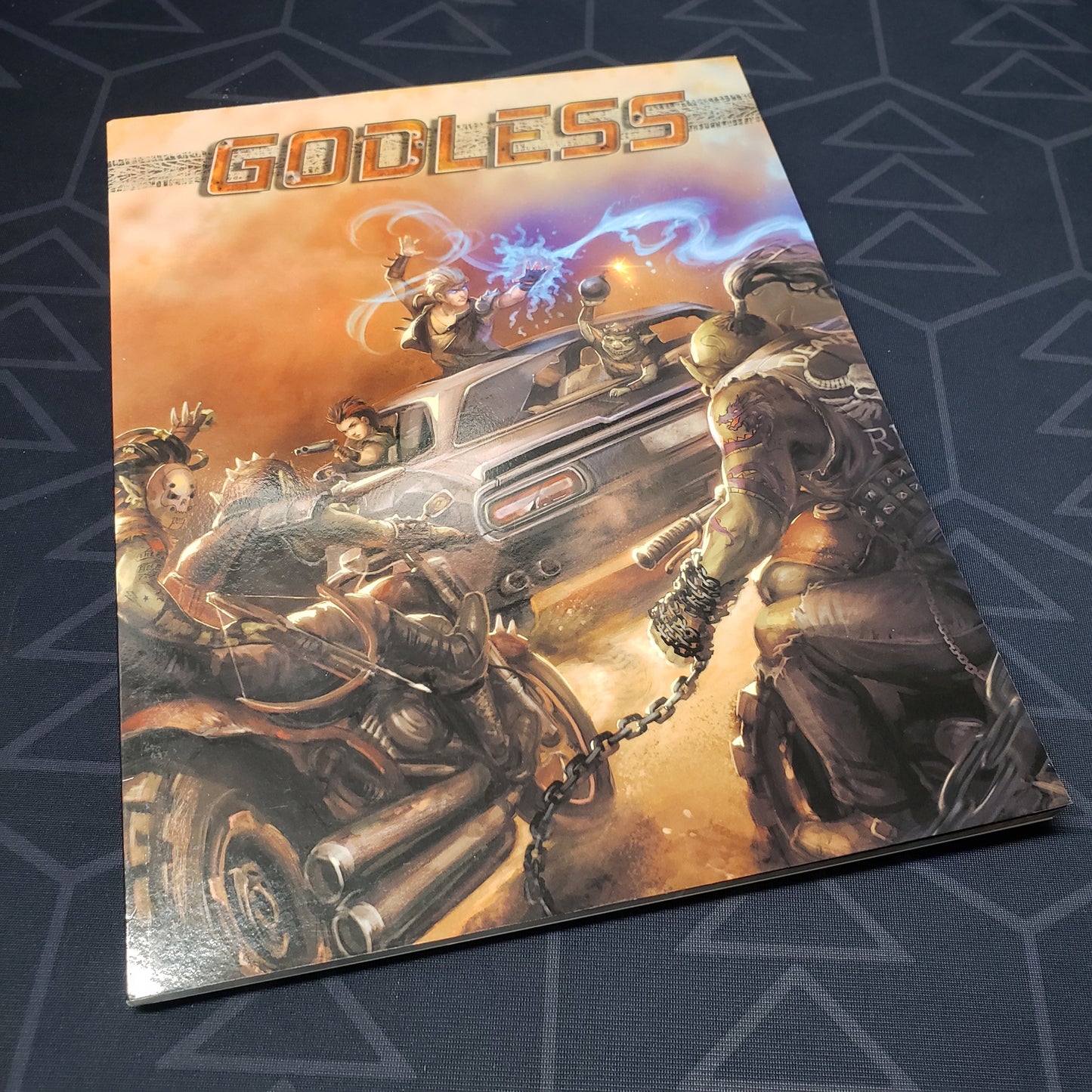 Image shows the front cover of the Godless book for the roleplaying game Shadow of the Demon Lord