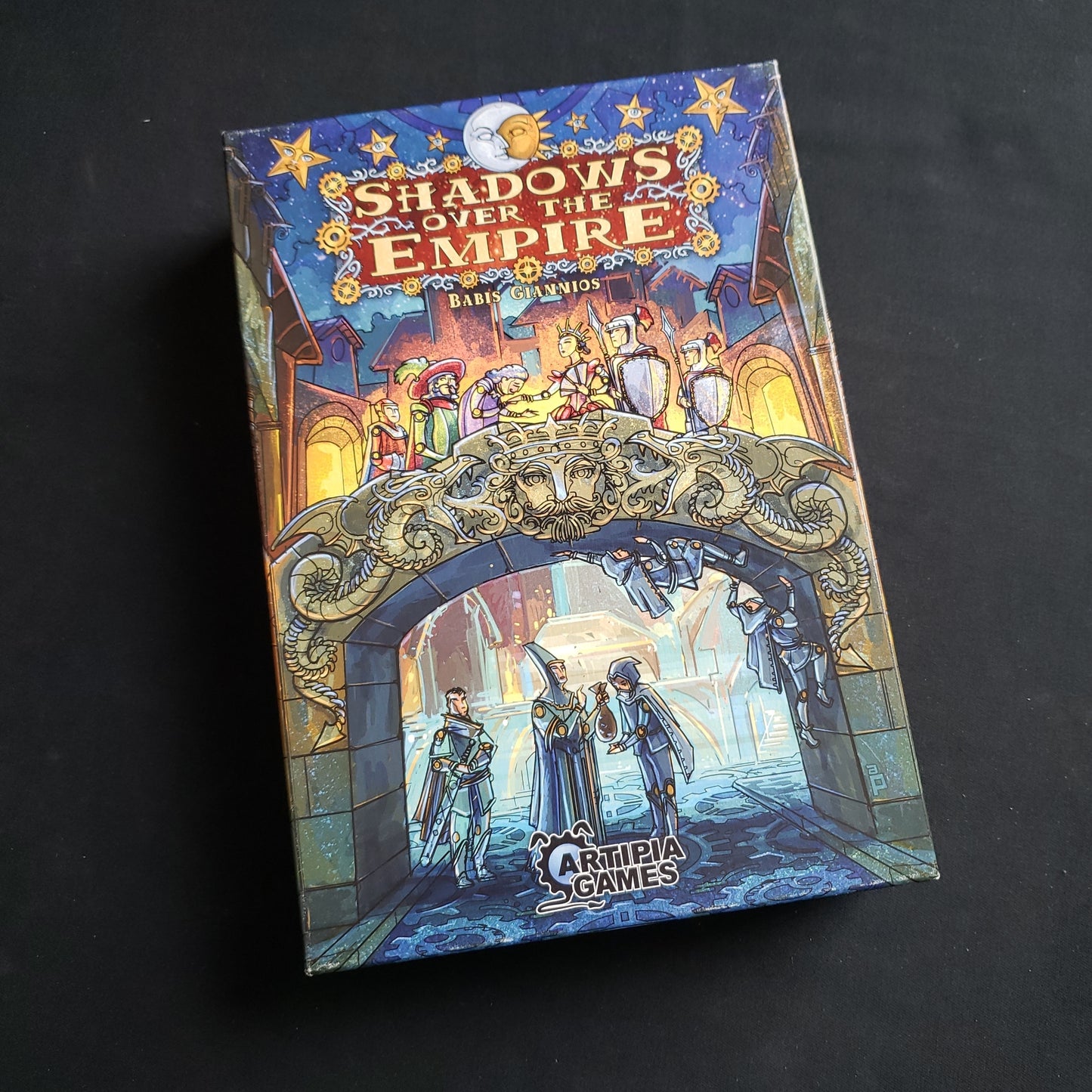 Image shows the front cover of the box of the Shadows Over the Empire card game