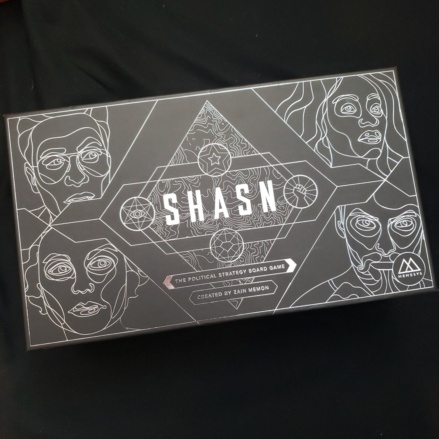Image shows the front cover of the box of the SHASN: Presidential Edition board game