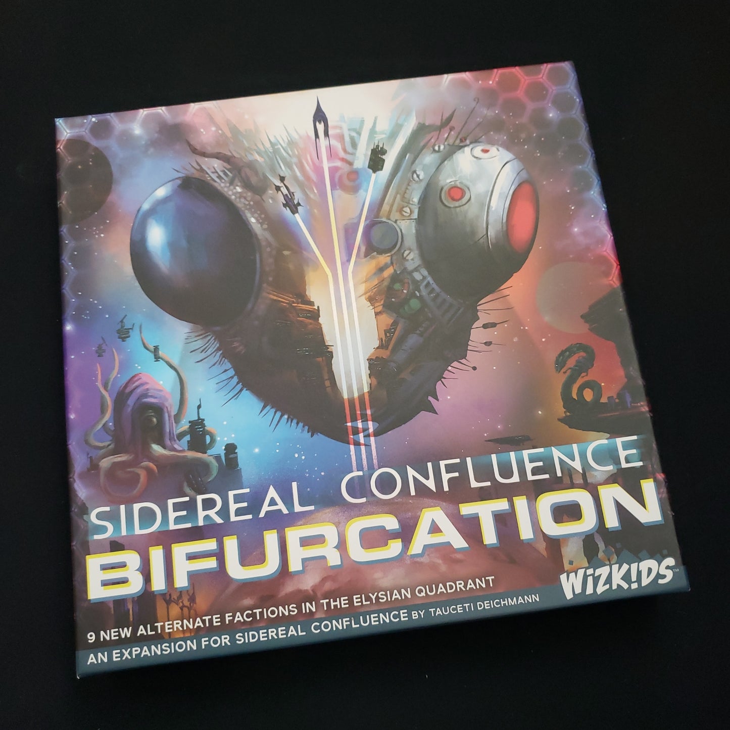 Image shows the front cover of the box of the Bifurcation expansion for the board game Sidereal Confluence