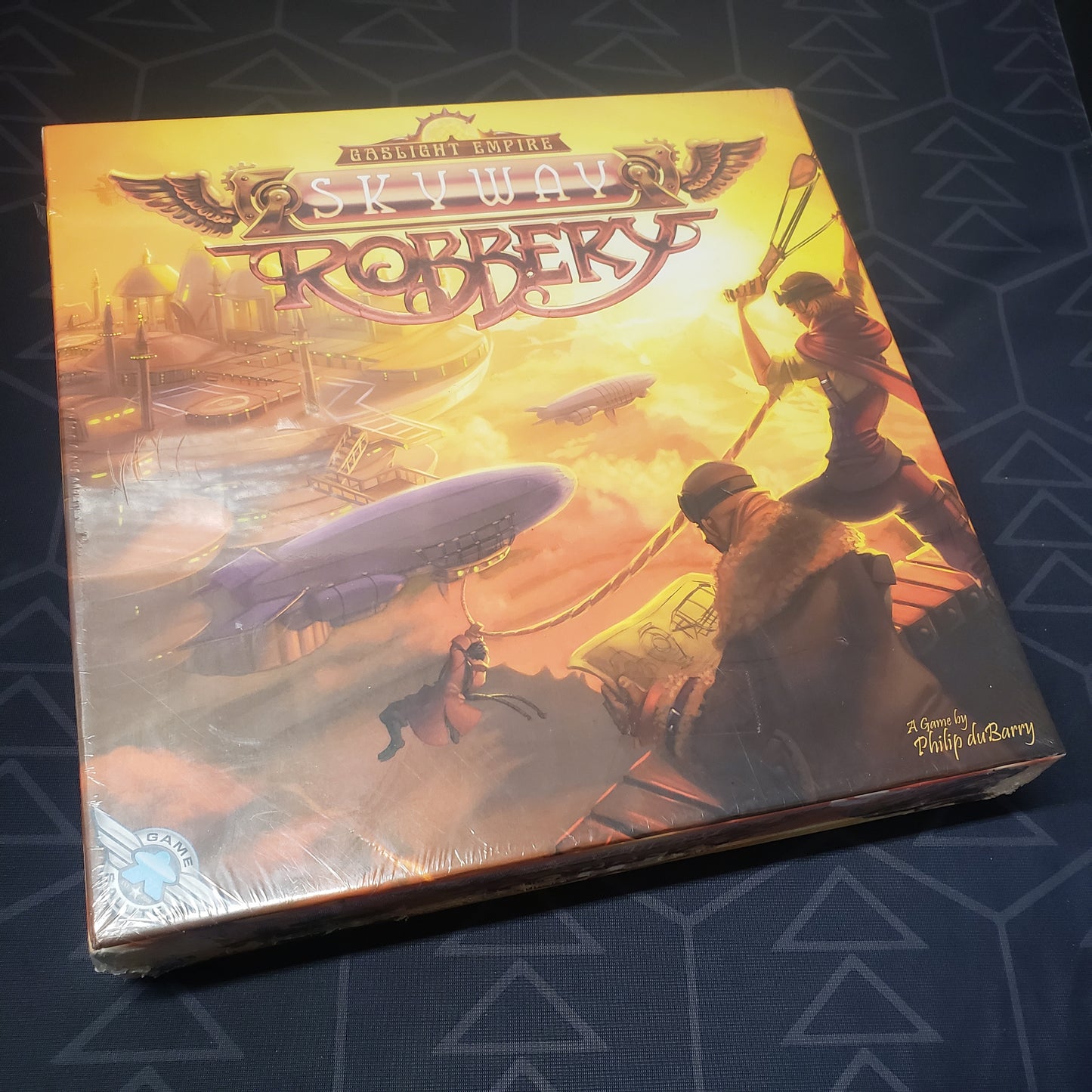 Image shows the front cover of the box for the Skyway Robbery board game