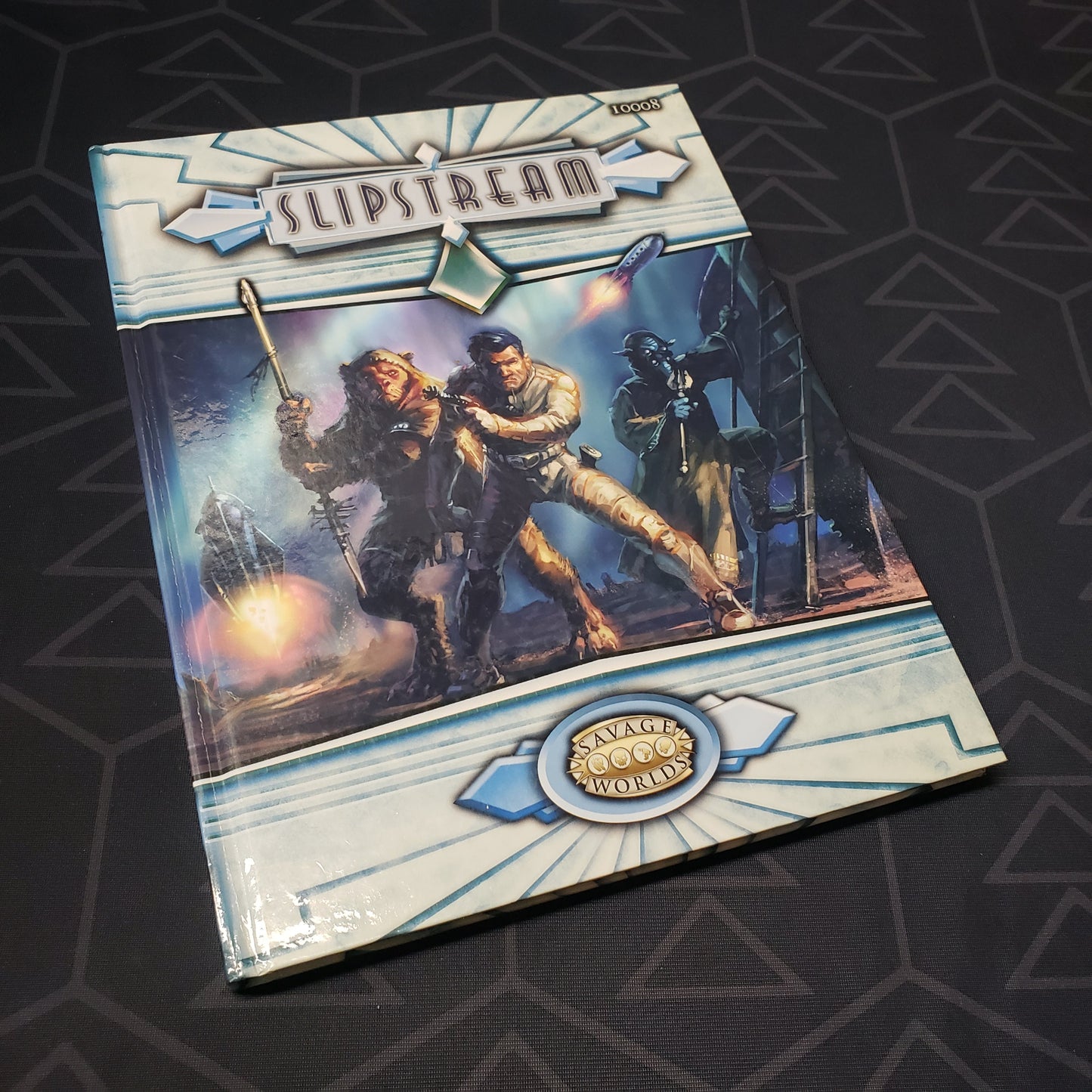 Image shows the front cover of the Slipstream (Savage Worlds) roleplaying game book