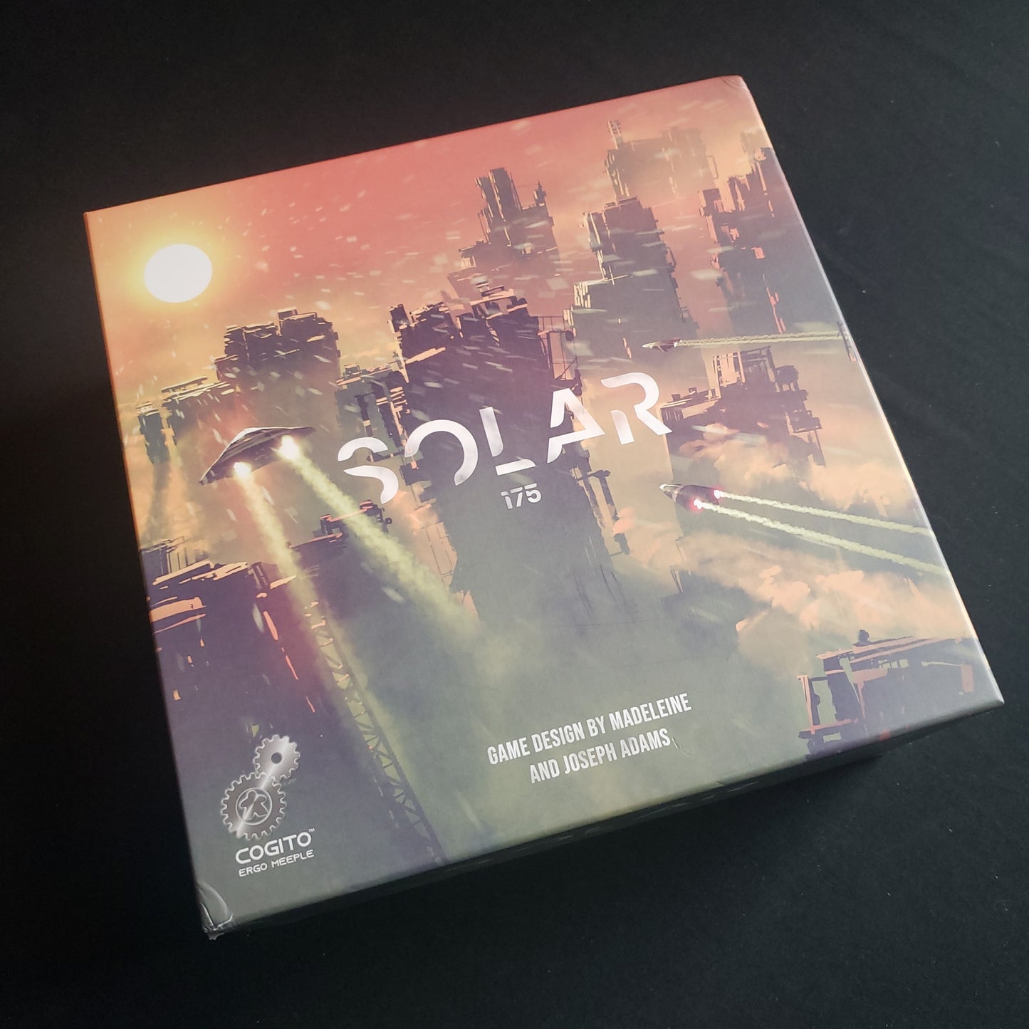 Image shows the front cover of the box of the Solar 175 board game
