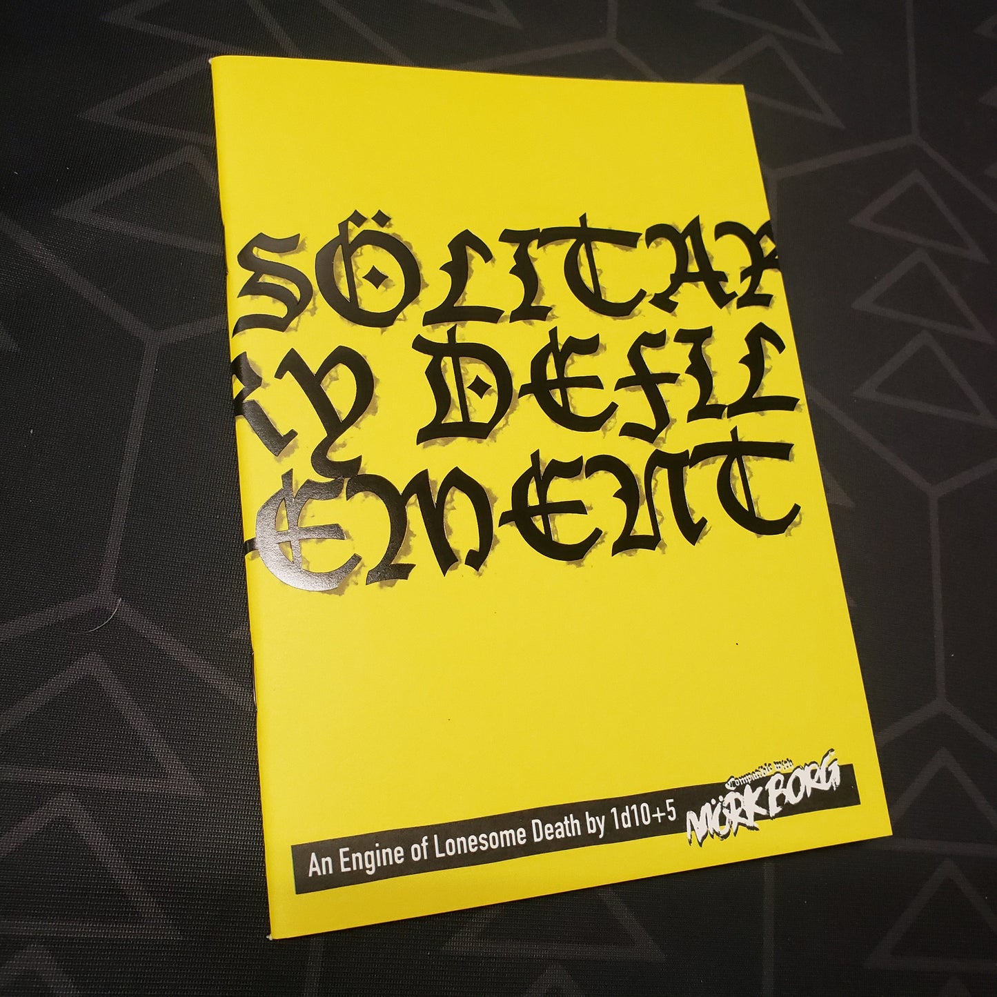Image shows the front cover of the Solitary Defilement roleplaying game book