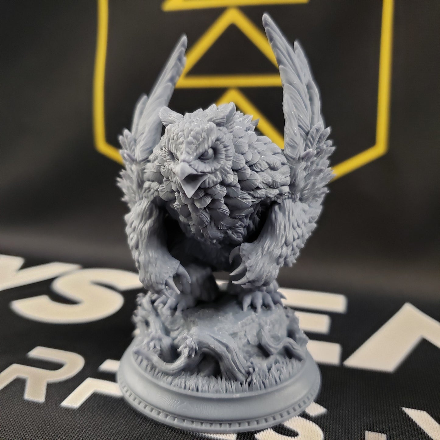 Image shows a 3D printed owlbear gaming miniature