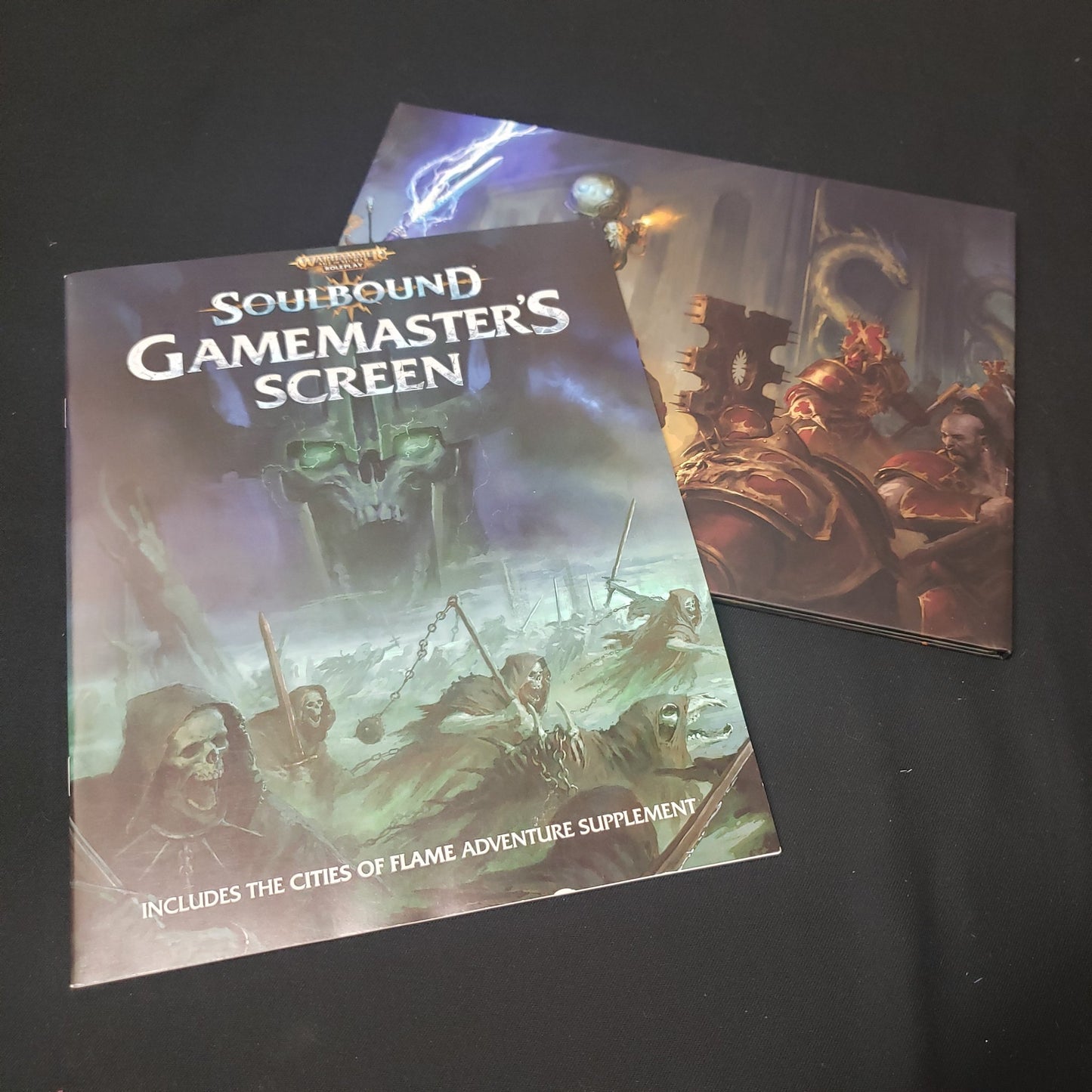 Image shows the front cover of an adventure supplement & gamemaster's screen for the roleplaying game Soulbound