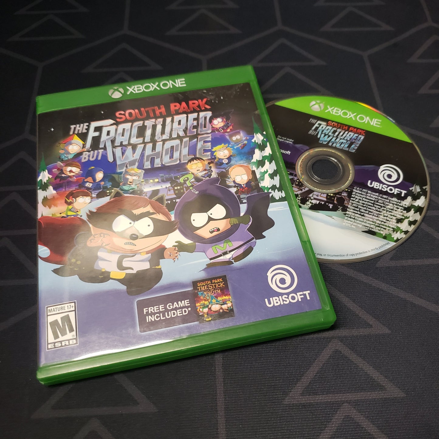 Image shows the case and disc for the video game South Park: The Fractured but Whole for Xbox One