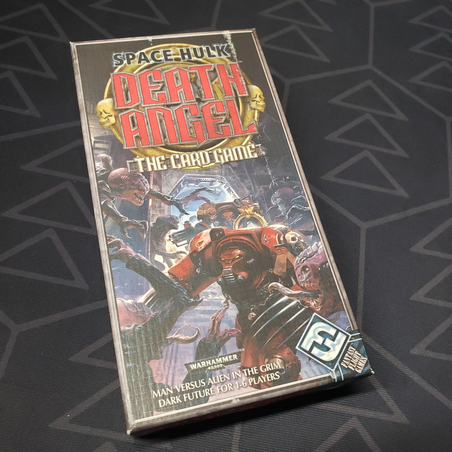 Image shows the front cover of the box of Space Hulk: Death Angel The Card Game