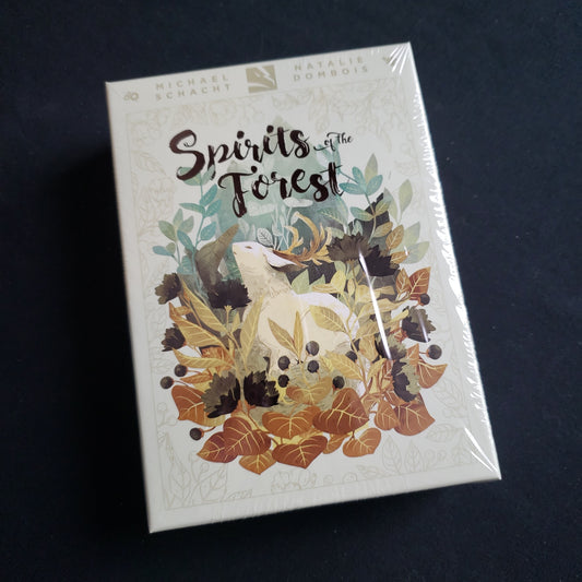 Image shows the front cover of the box of the Spirits of the Forest board game