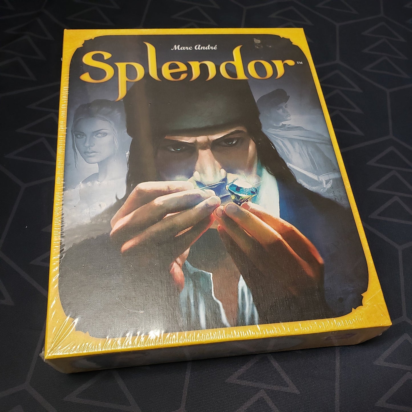 Image shows the front cover of the box of the Splendor board game