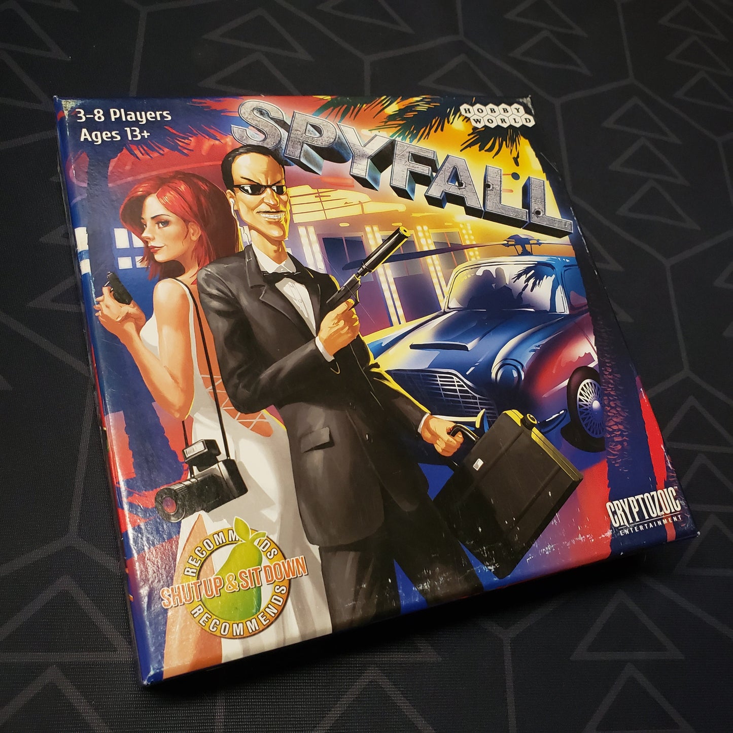 Image shows the front cover of the box of the Spyfall card game