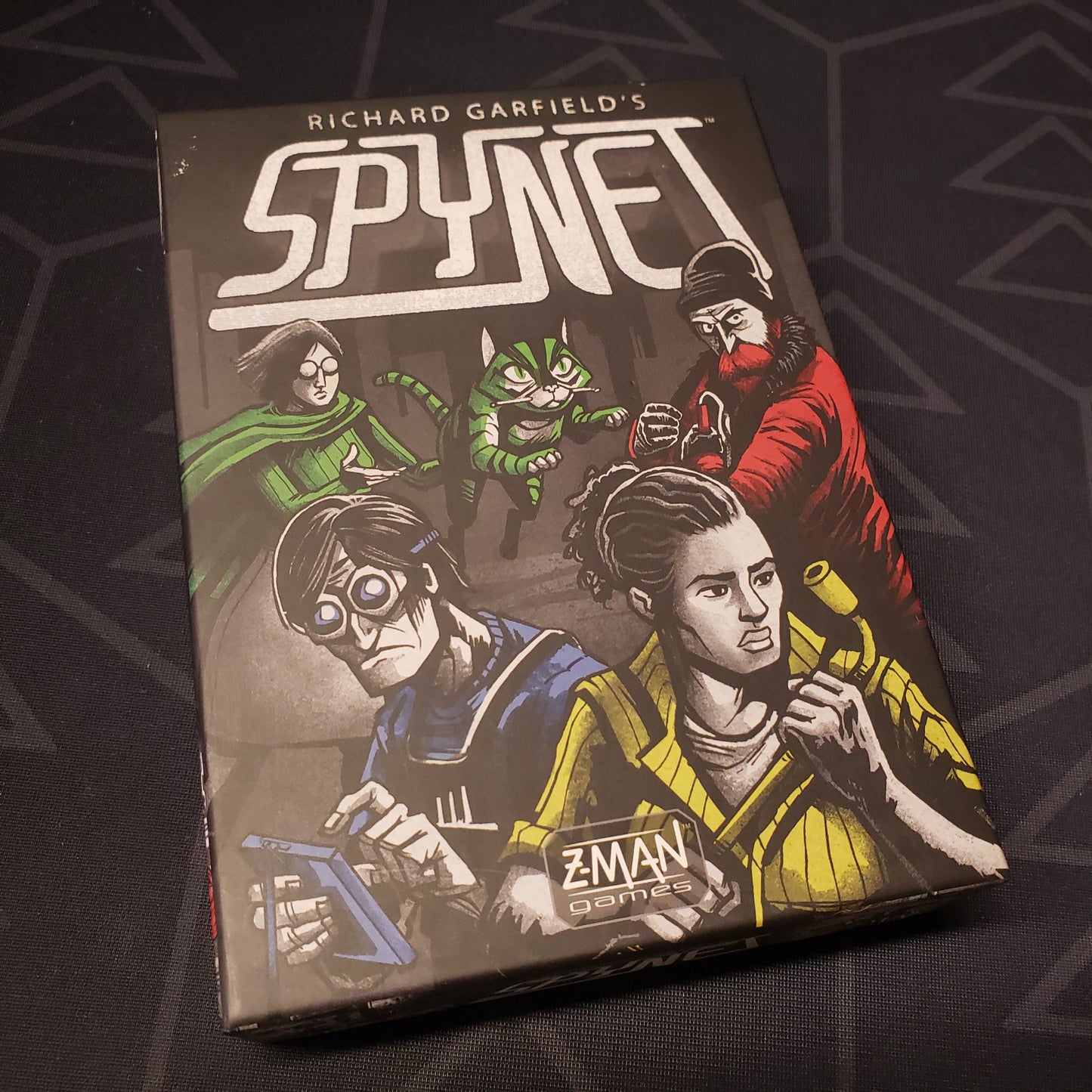 Image shows the front cover of the box of the SpyNet card game