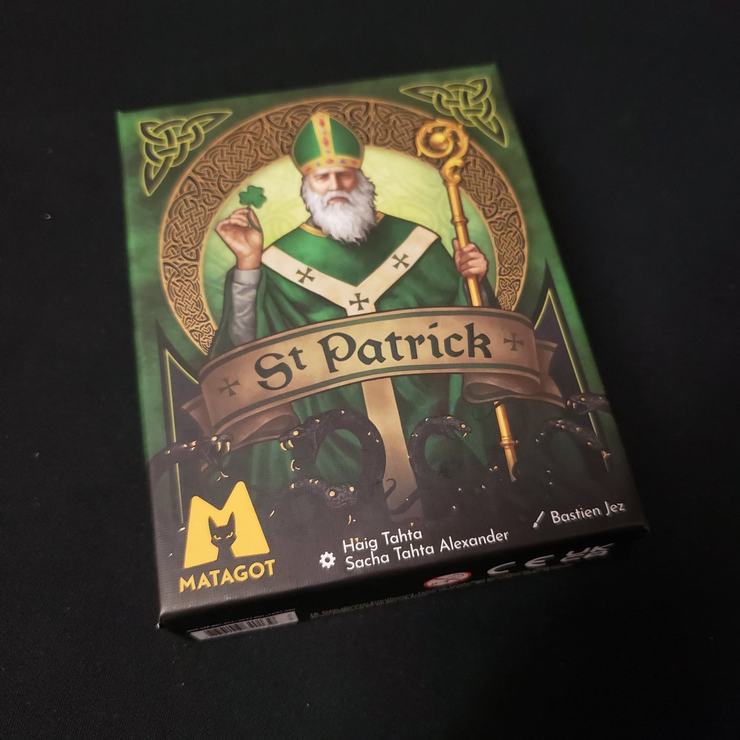 Image shows the front cover of the box of the St Patrick card game